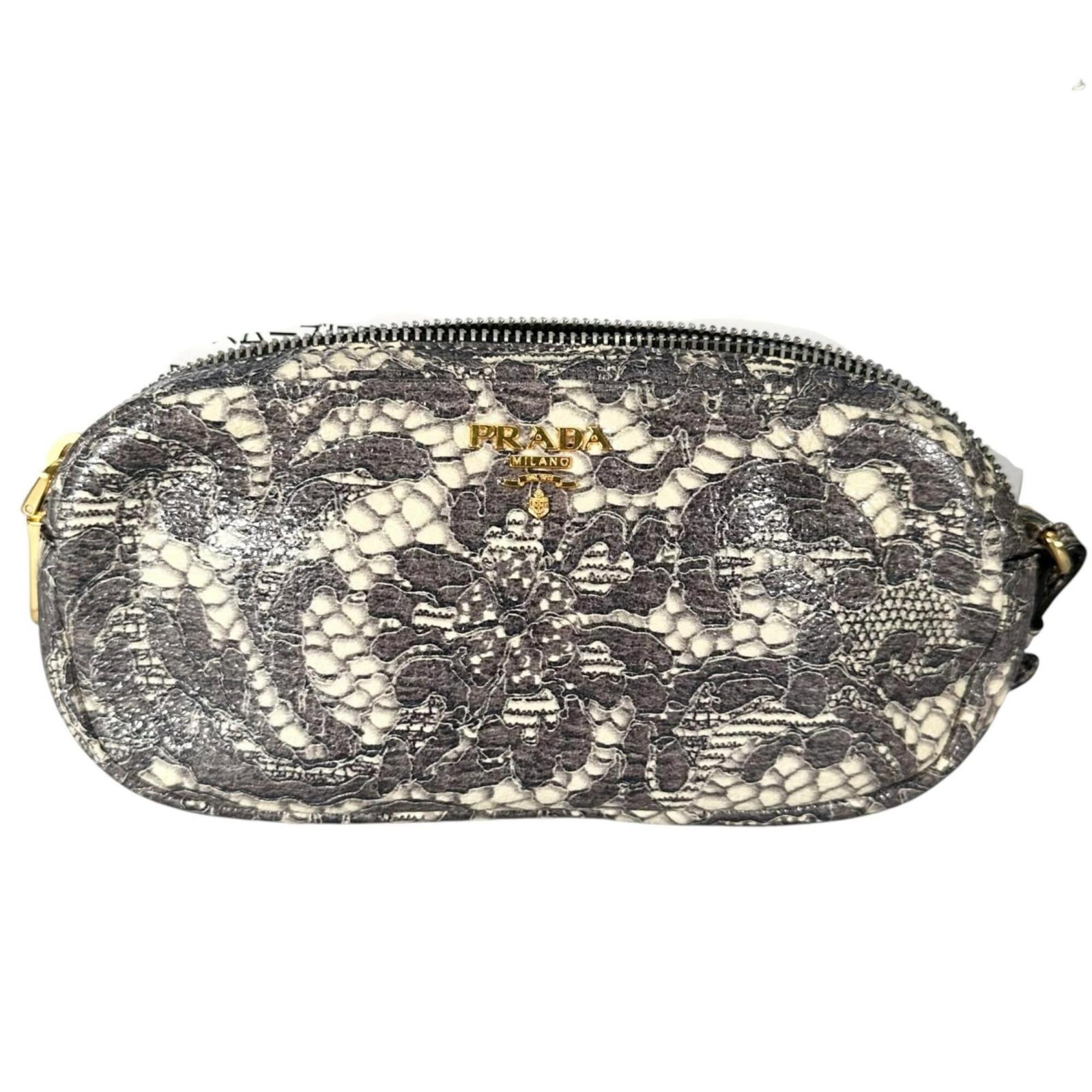 Nylon Prada pouch: Nylon Prada pouch The Prada nylon pouch features a sleek gray color and a compact design, measuring 10cm x 20cm x 4cm. With its durable nylon material, it has withstood some wear and tear, showcasing