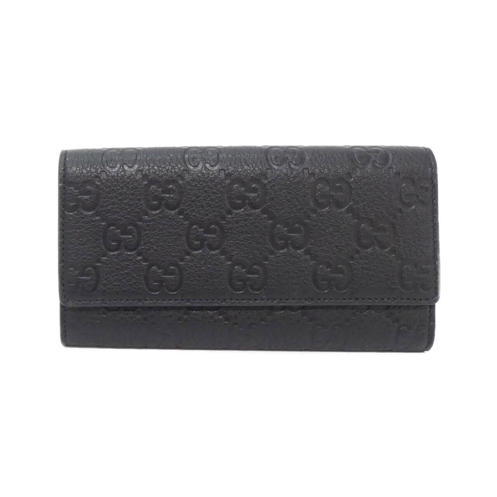 Gucci Wallet (Bi-Fold): Gucci Wallet (Bi-Fold) A pre-owned Gucci bi-fold wallet in black, featuring a classic design with clean lines and subtle details. The wallet has some minor signs of usage, including scratches and