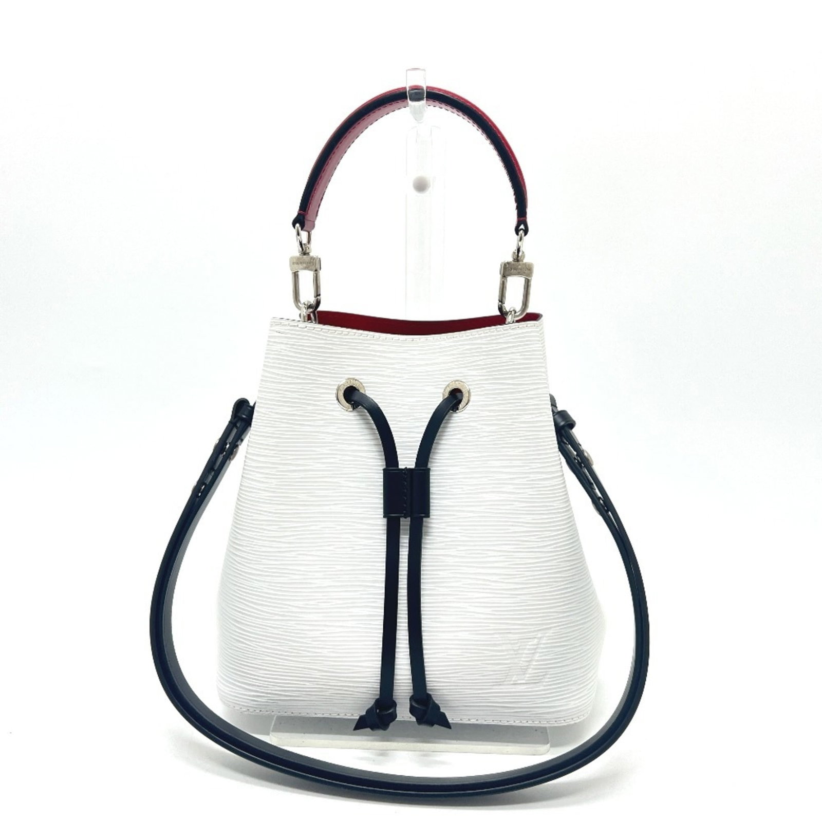 Louis Vuitton Shoulder Bag Epi Leather: Louis Vuitton Shoulder Bag Epi Leather Black, Red Color, Tricolor, and White Epi Leather Shoulder Bag from Louis Vuitton. This classic shoulder bag features the iconic Epi leather material, with