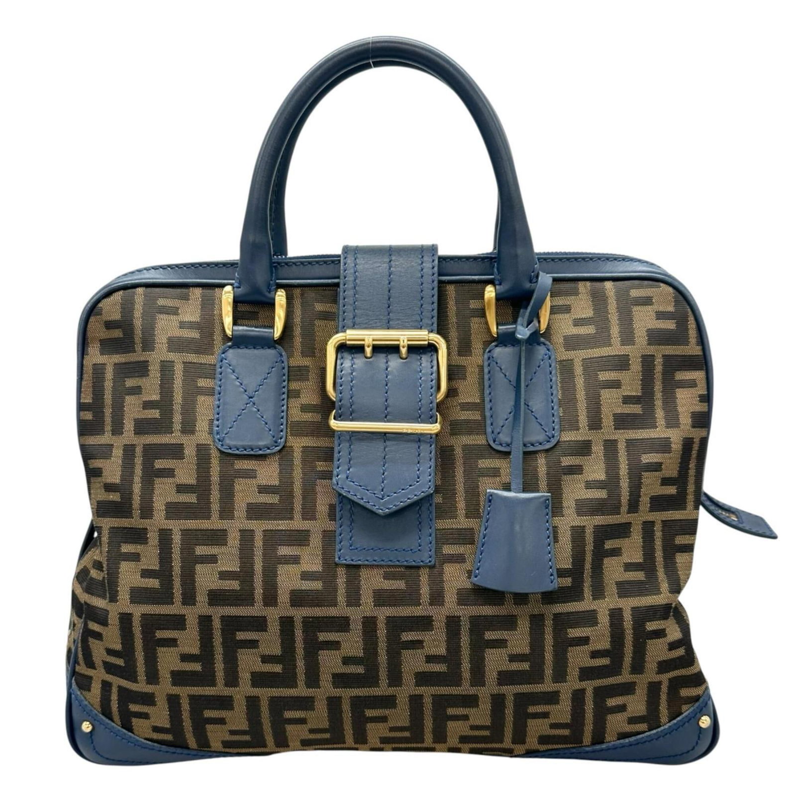 Handbag Canvas Leather Fendi: Handbag Canvas Leather Fendi Canvas and leather blend in this iconic Fendi handbag, available in blue and brown hues. The gold hardware adds a touch of luxury to the overall design. With its canvas
