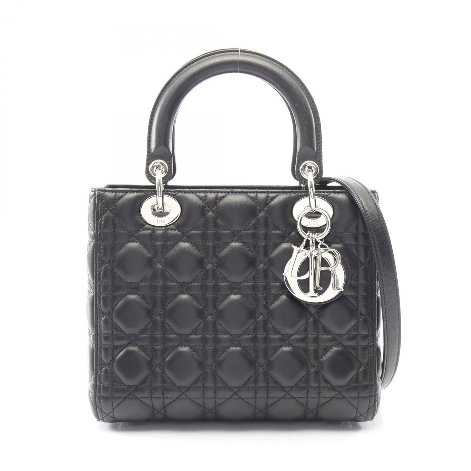 Handbag of leather by Christian Dior: Handbag of leather by Christian Dior Christian Dior's black leather handbag boasts a sleek design with clean lines and a timeless silhouette. Measuring 20cm x 24cm x 11cm, it offers ample space for
