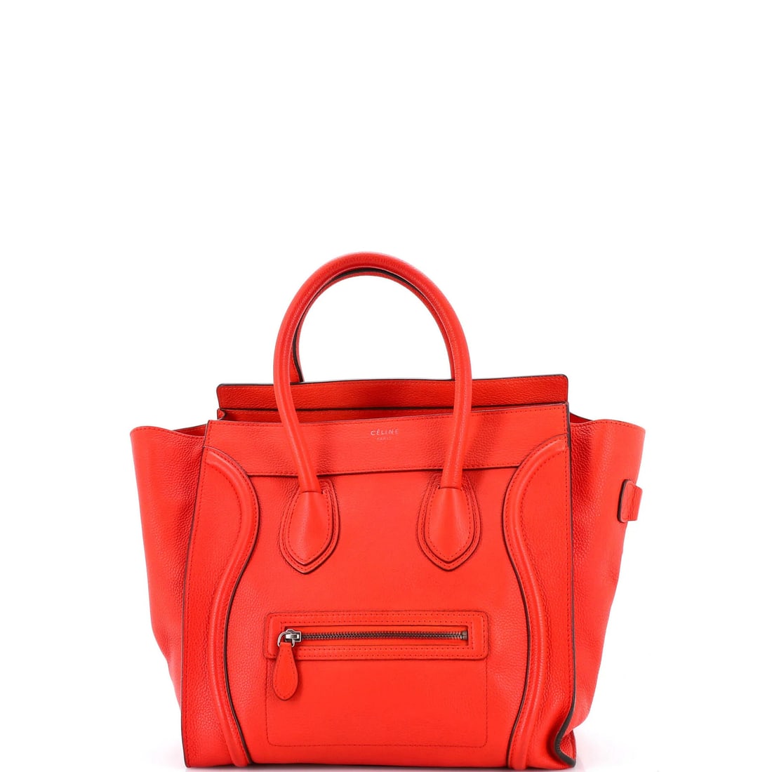 Luggage Bag Grainy Leather Mini Celine: Luggage Bag Grainy Leather Mini Celine The Celine Luggage Bag Grainy Leather Mini in red features a unique grainy leather exterior with minor edge wear, corner wear, and scuffs. This mini tote