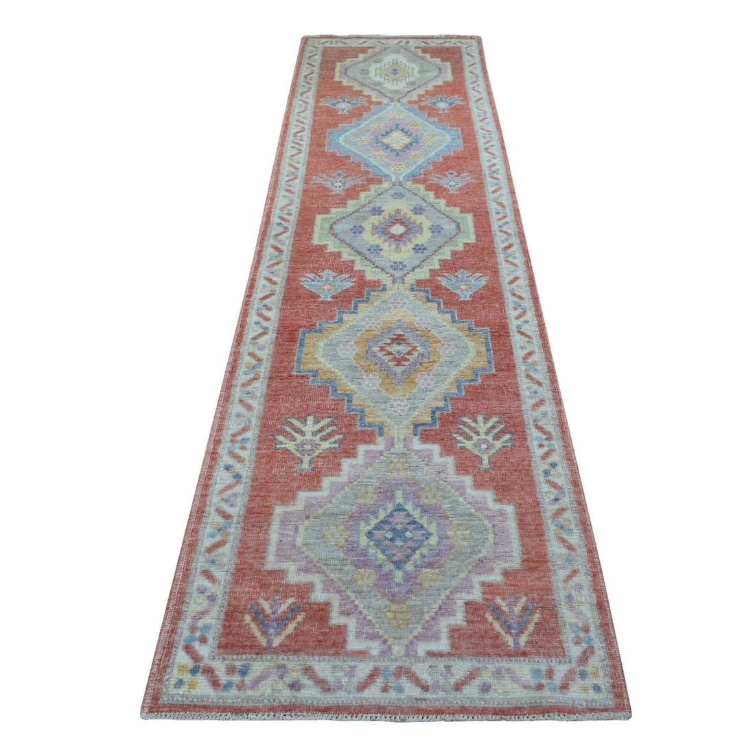 2'9"x10'5" Soft Wool Hand Knotted Coral Red Angora Oushak Runner Rug: 2'9"x10'5" Soft Wool Hand Knotted Coral Red Angora Oushak Runner Rug Softly glowing coral red hues adorn this stunning hand-knotted Afghan Oushak runner rug, crafted from plush wool and boasting an in