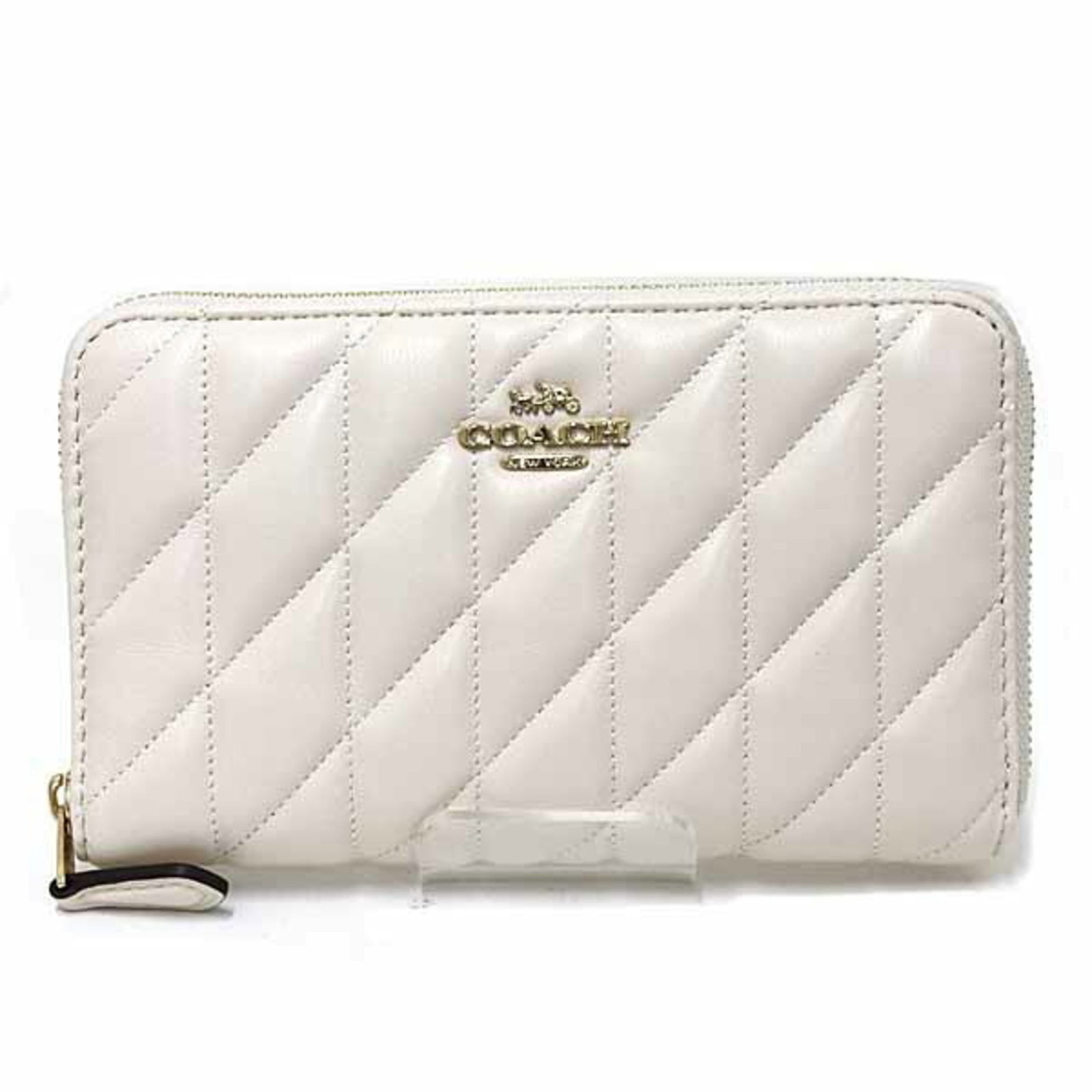 Coach Wallet (Bi-Fold): Coach Wallet (Bi-Fold) This Coach bi-fold wallet features a classic design with a zipper closure, measuring 10cm x 16.5cm x 2cm. With some minor signs of wear, such as scratches and dirt, it remains