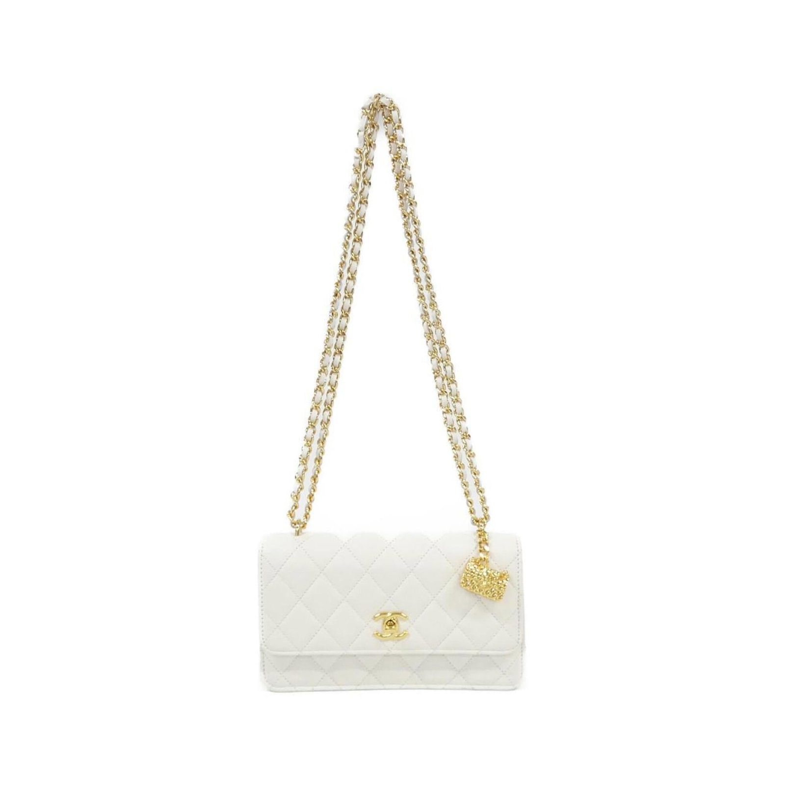 Calfskin shoulder bag by Chanel: Calfskin shoulder bag by Chanel Calfskin shoulder bag by Chanel, featuring grained Calfskin material and a classic white color. This used (very good) bag has a few traces of usage, some scratches / di