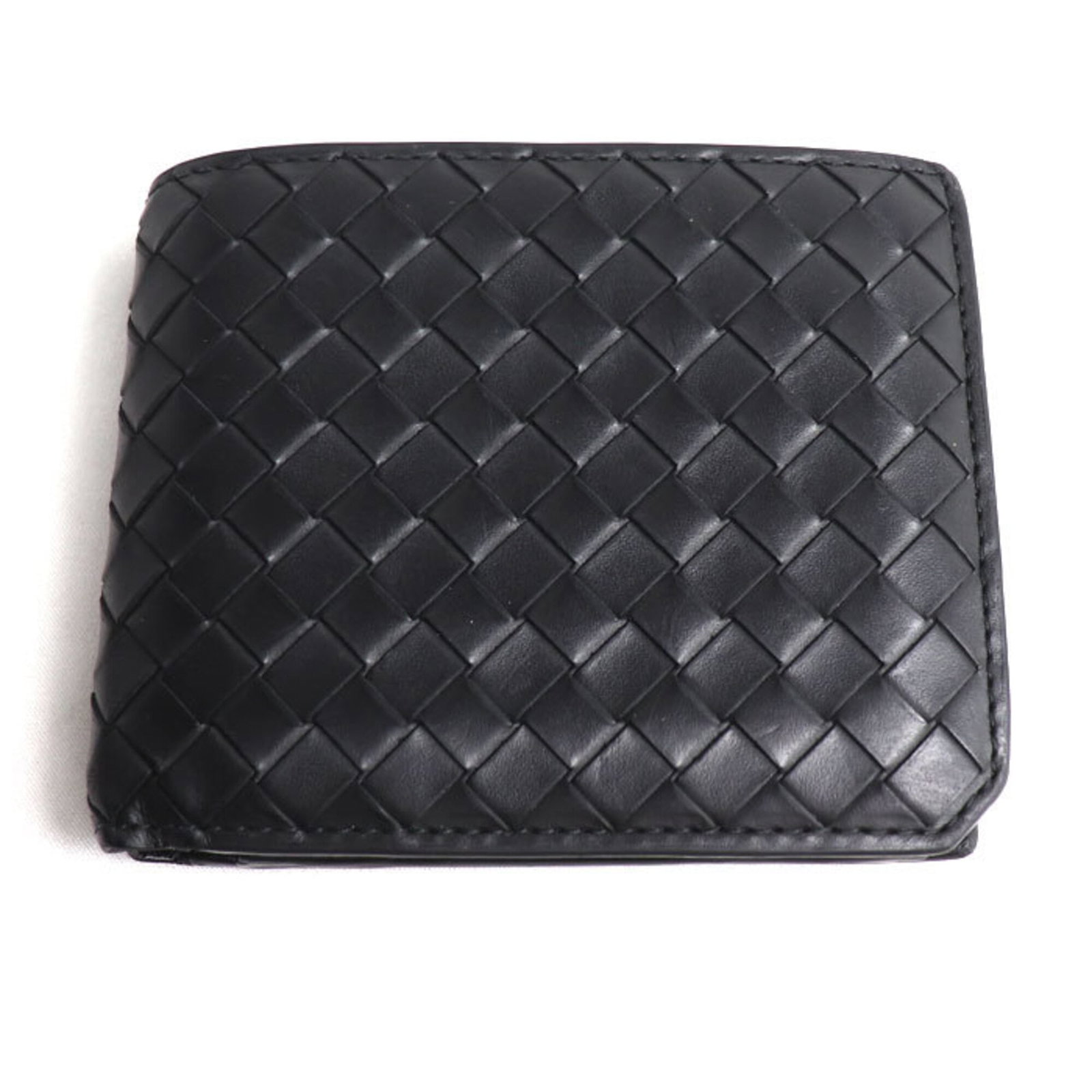Bottega Veneta Wallet (Bi-Fold) Leather: Bottega Veneta Wallet (Bi-Fold) Leather The Bottega Veneta bi-fold leather wallet features a classic design with a timeless black calfskin material. With its 9.5cm x 11cm dimensions, it provides ample