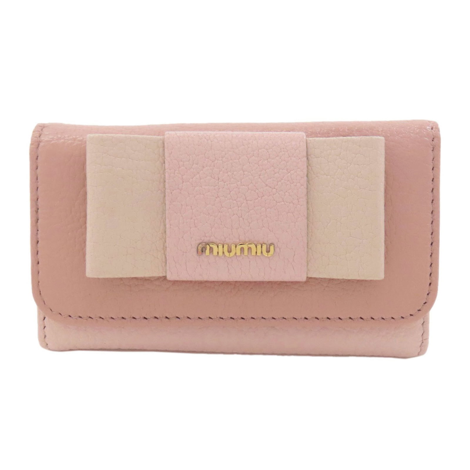 Keycase Leather: Keycase Leather Pink leather keycase in very good condition, with some traces of usage and minor scratches/dirt. The case bears a signature, but details on the identity of the signer are not