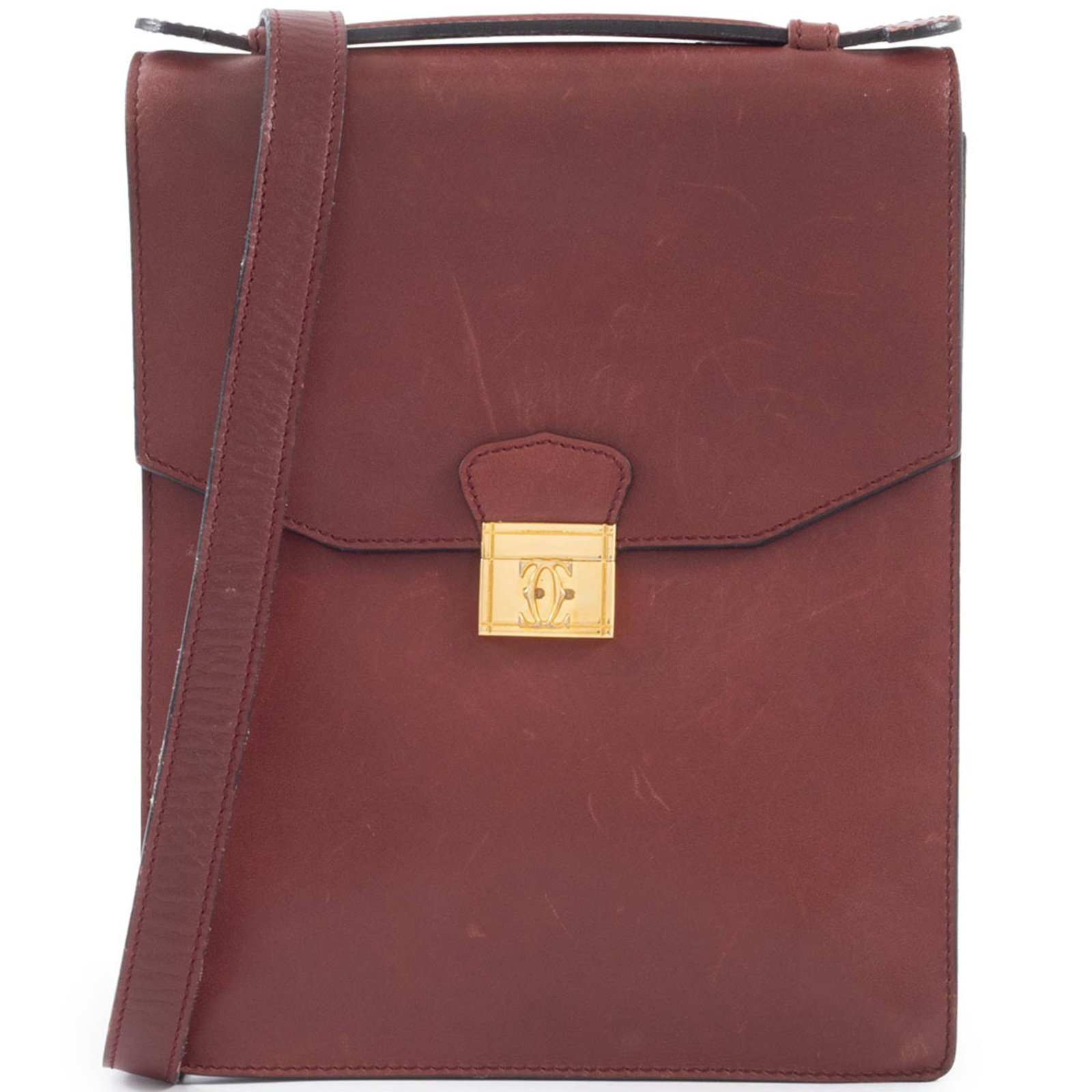 Shoulder Bag Leather by Cartier: Shoulder Bag Leather by Cartier Bordeaux leather shoulder bag by Cartier, featuring a classic design with a slide lock closure. The bag measures 26cm x 21cm x 4cm and has a handle length of 15cm,
