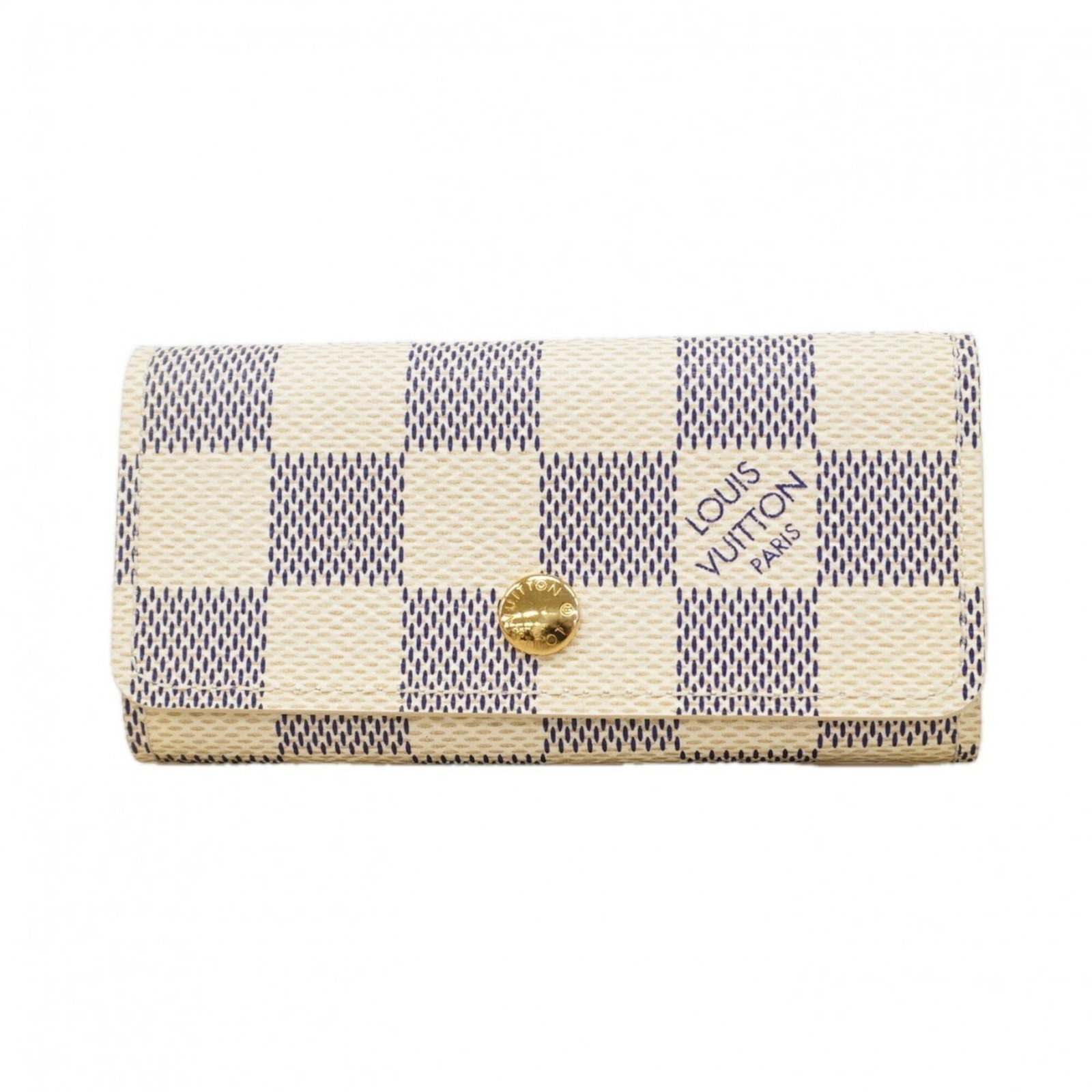 Keycase by Louis Vuitton: Keycase by Louis Vuitton White Louis Vuitton Keycase in very good condition, with some minor scratches and dirt visible. This classic keycase features the iconic LV monogram pattern, adding a touch