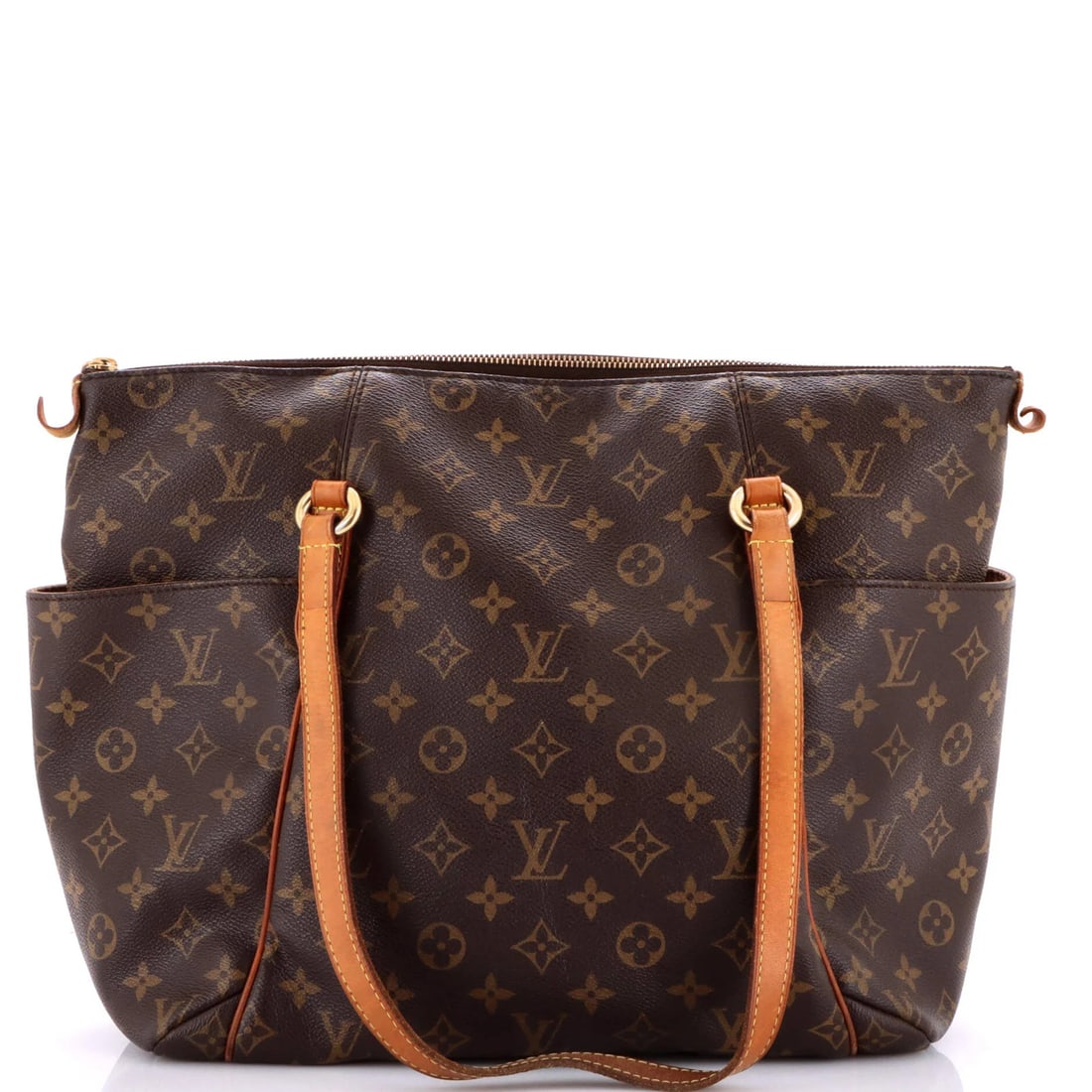 Totally Monogram Handbag Canvas Louis Vuitton MM: Totally Monogram Handbag Canvas Louis Vuitton MM Totally Monogram Handbag Canvas Louis Vuitton MM features a classic brown canvas exterior with heavy edge wear, discoloration throughout, and scuffs.