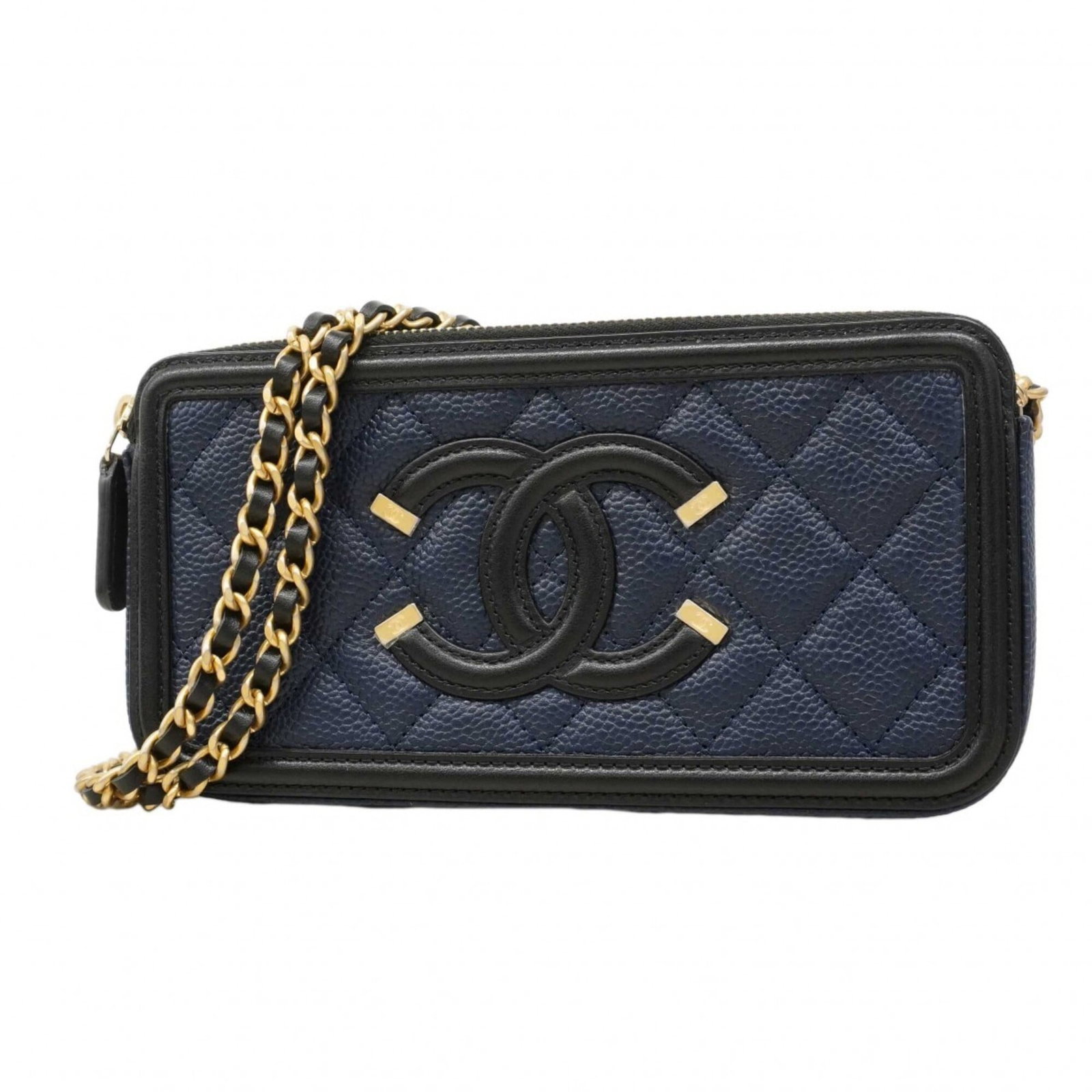 Calfskin shoulder bag by Chanel: Calfskin shoulder bag by Chanel Calfskin shoulder bag by Chanel, featuring grained Calfskin material and a classic design. This black or navy piece measures 9.5cm x 18.5cm x 3.5cm, with some traces of