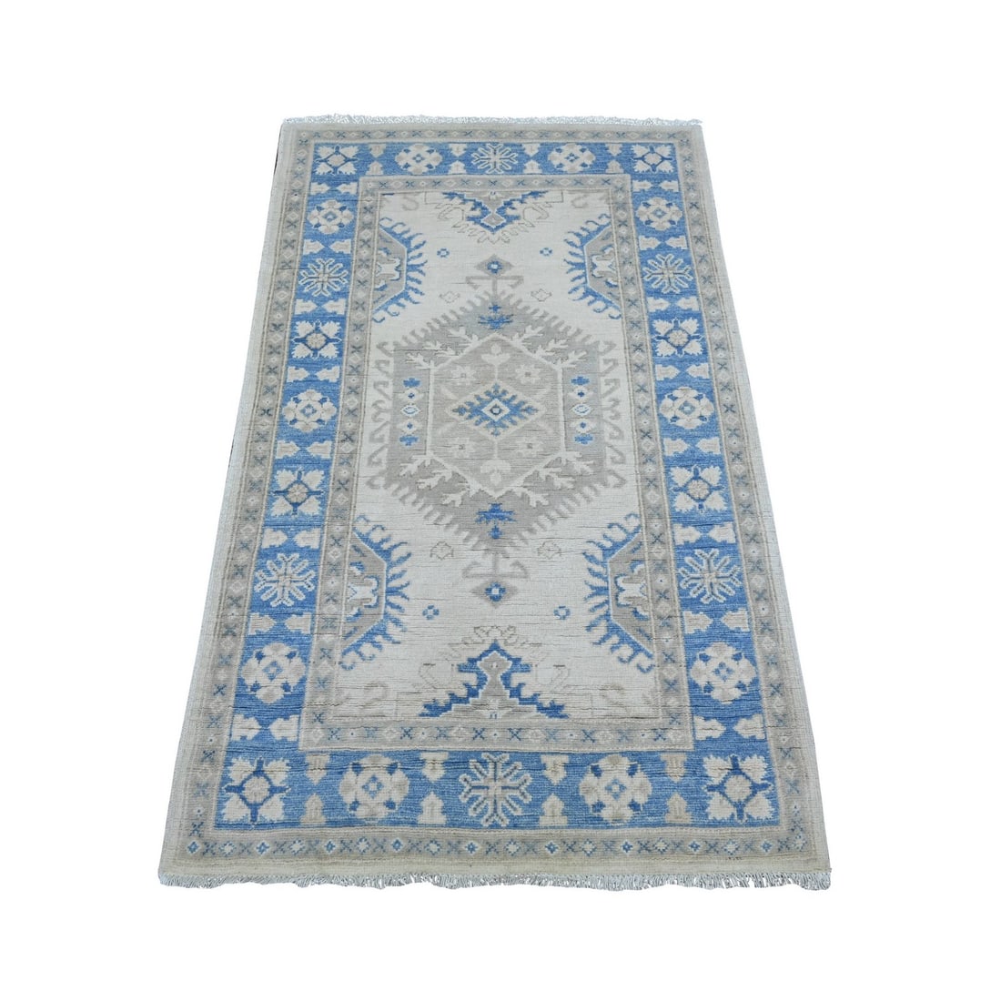 3'x4'10" Ivory Vintage Look Kazak with Geometric Elements Wool Hand Knotted: 3'x4'10" Ivory Vintage Look Kazak with Geometric Elements Wool Hand Knotted This stunning 3'x4'10" Ivory Kazak rug boasts intricate geometric elements in a traditional wool hand-knotted design,