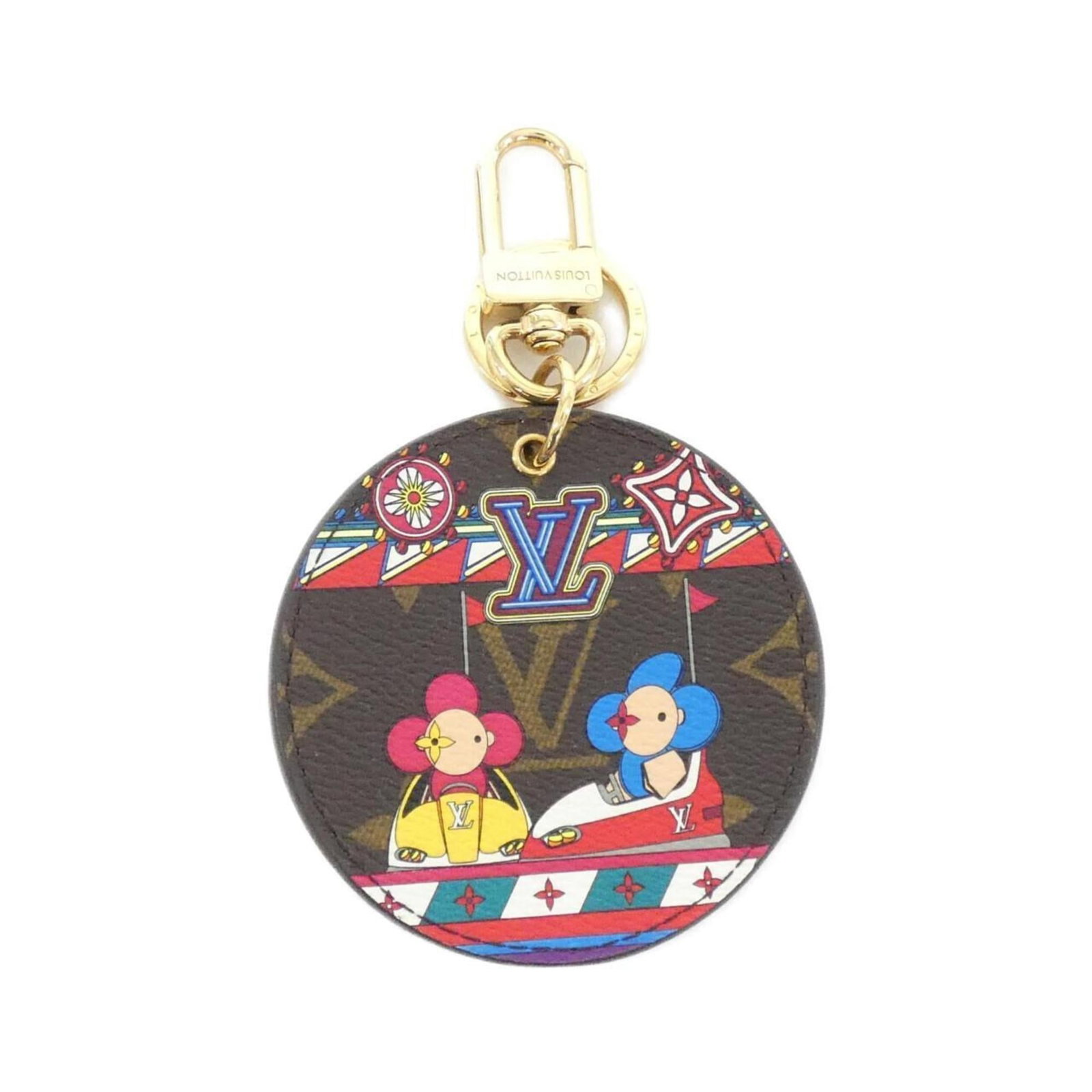 Louis Vuitton Keyring: Louis Vuitton Keyring Marron Louis Vuitton keyring in very good condition, with a few traces of usage and some minor scratches/dirt. The keyring bears the signature of its creator, a testament to the