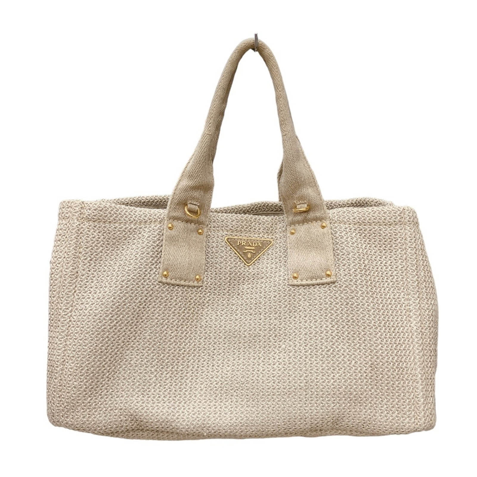 Canvas tote bag by Prada: Canvas tote bag by Prada Canvas tote bag by Prada, featuring beige canvas material and a classic design. Measuring 24cm x 40cm x 25cm, it has a sturdy handle drop of 17cm. This used Prada tote shows