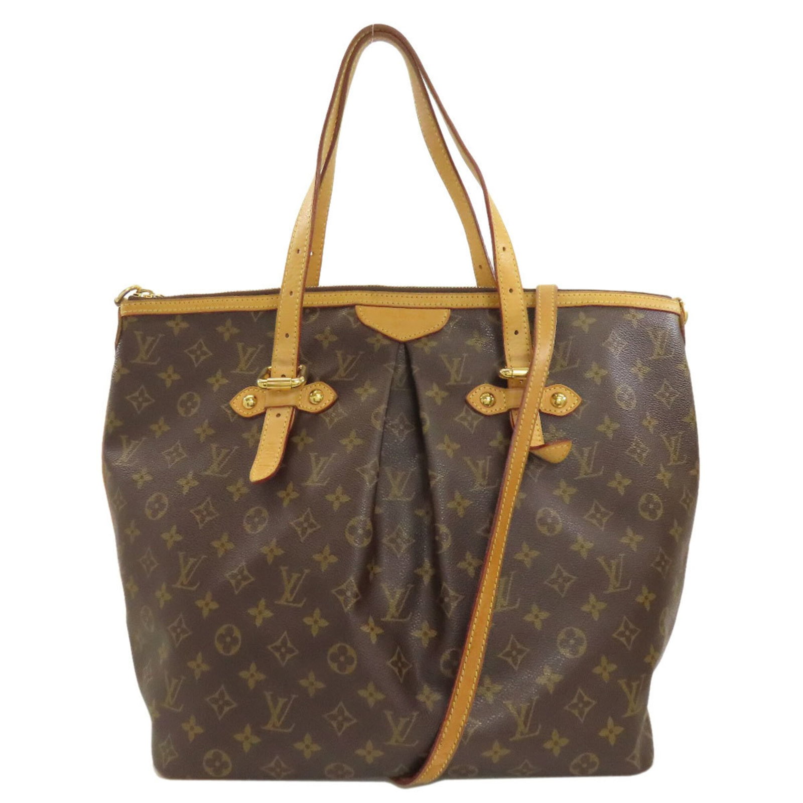Tote bag monogram Louis Vuitton: Tote bag monogram Louis Vuitton Monogrammed Louis Vuitton tote bag with a classic design, featuring the iconic LV monogram pattern. The bag has some signs of usage, including scratches and dirt, but