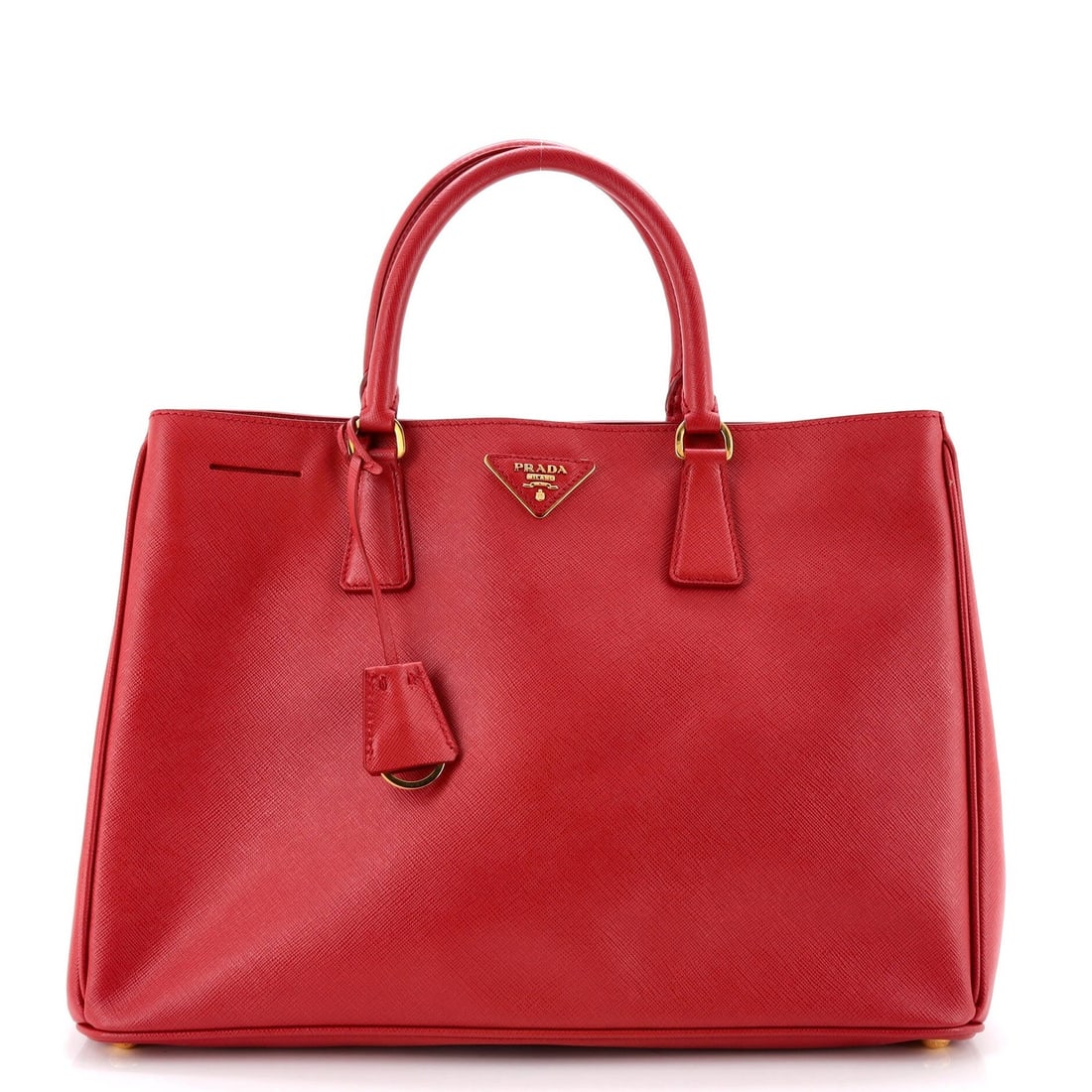 Lux open tote saffiano leather large prada: Lux open tote saffiano leather large prada Red Lux Open Tote Saffiano Leather Large, featuring a classic design with gold hardware and interior fabric. Measuring 10" high, 14.5" wide, and 7" deep, it