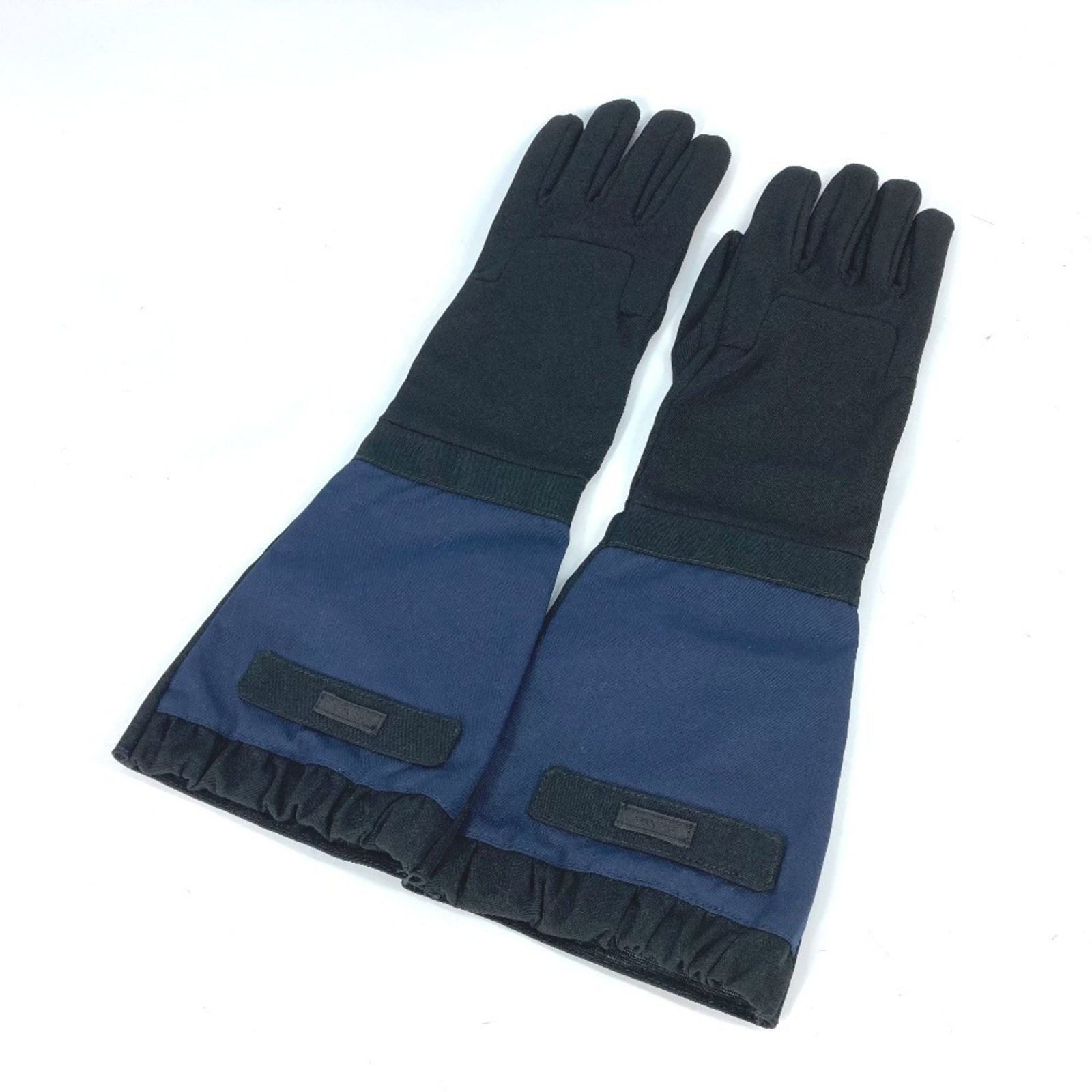 Nylon Rayon Gloves by Prada: Nylon Rayon Gloves by Prada Nylon Rayon Gloves by Prada in black and blue, featuring a unique blend of materials for durability and style. Made from a combination of nylon and rayon, these long