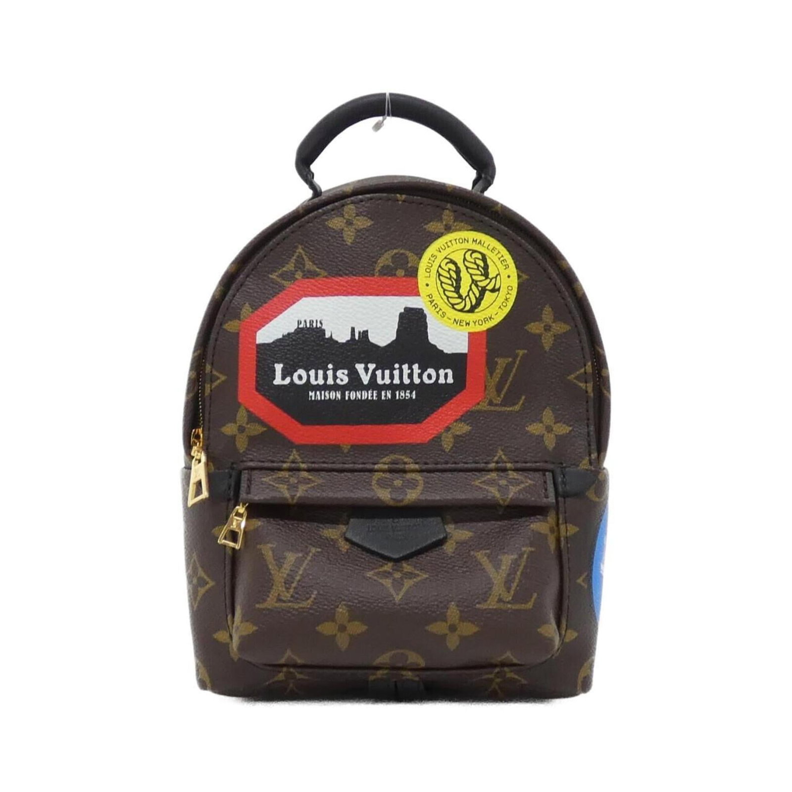 Coated Canvas Backpack by Louis Vuitton: Coated Canvas Backpack by Louis Vuitton Coated Canvas Backpack by Louis Vuitton - A Timeless Travel Companion. This iconic Marron-colored backpack features gold hardware and coated canvas material,