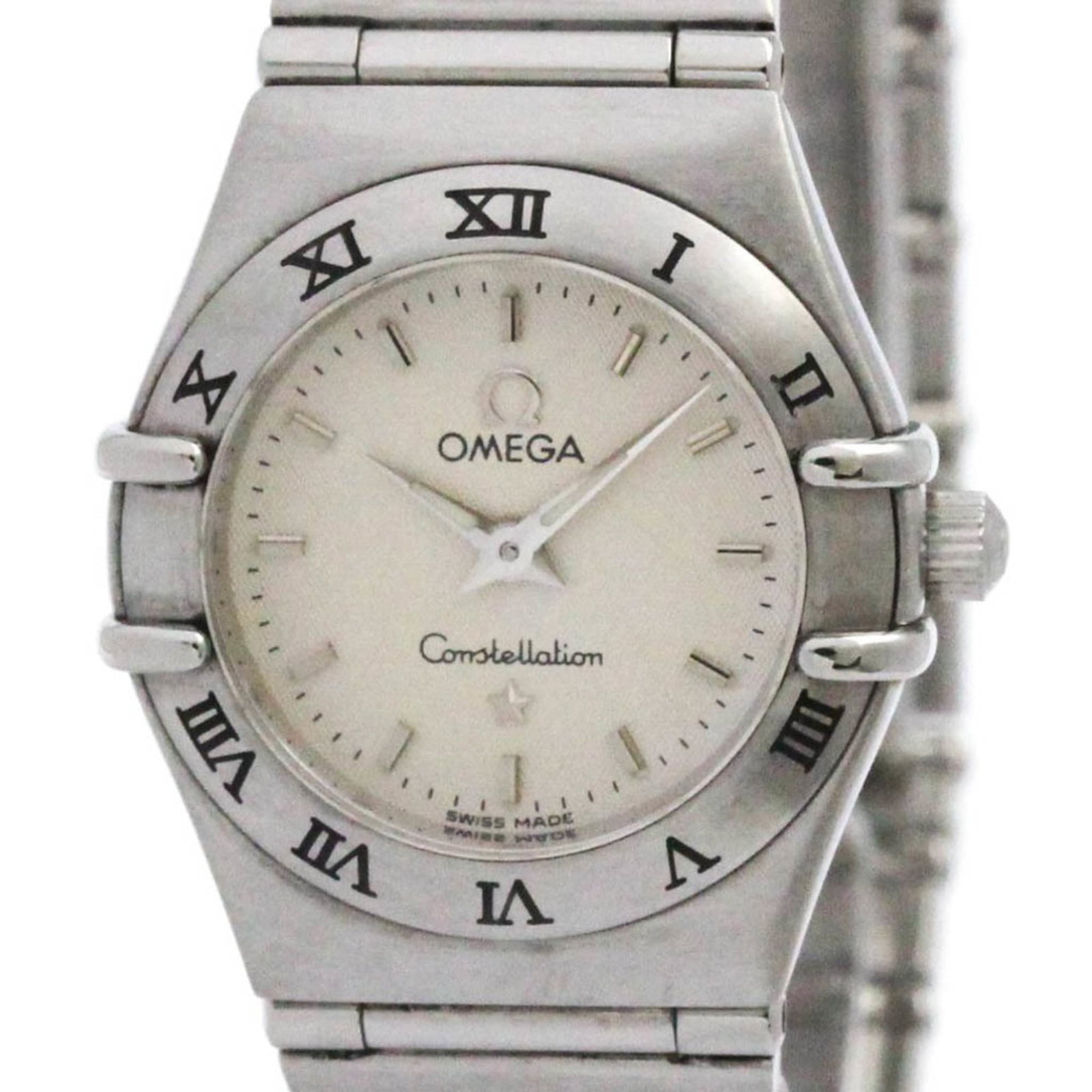 Omega Wristwatch: Omega Wristwatch Stainless steel case and band provide a sleek, modern look for the silver Omega wristwatch. With its classic design and durable construction, this watch is suitable for formal