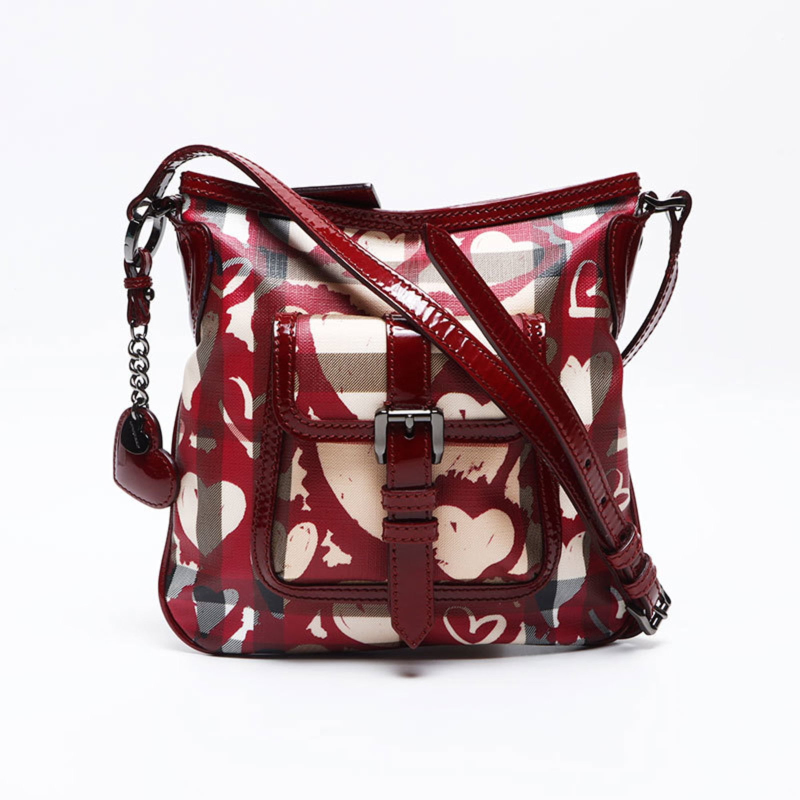 Shoulder Bag by Burberry: Shoulder Bag by Burberry Burberry's classic shoulder bag boasts a timeless design with a subtle beige and red color combination. The bag features a handle drop of 23.50cm, providing comfortable