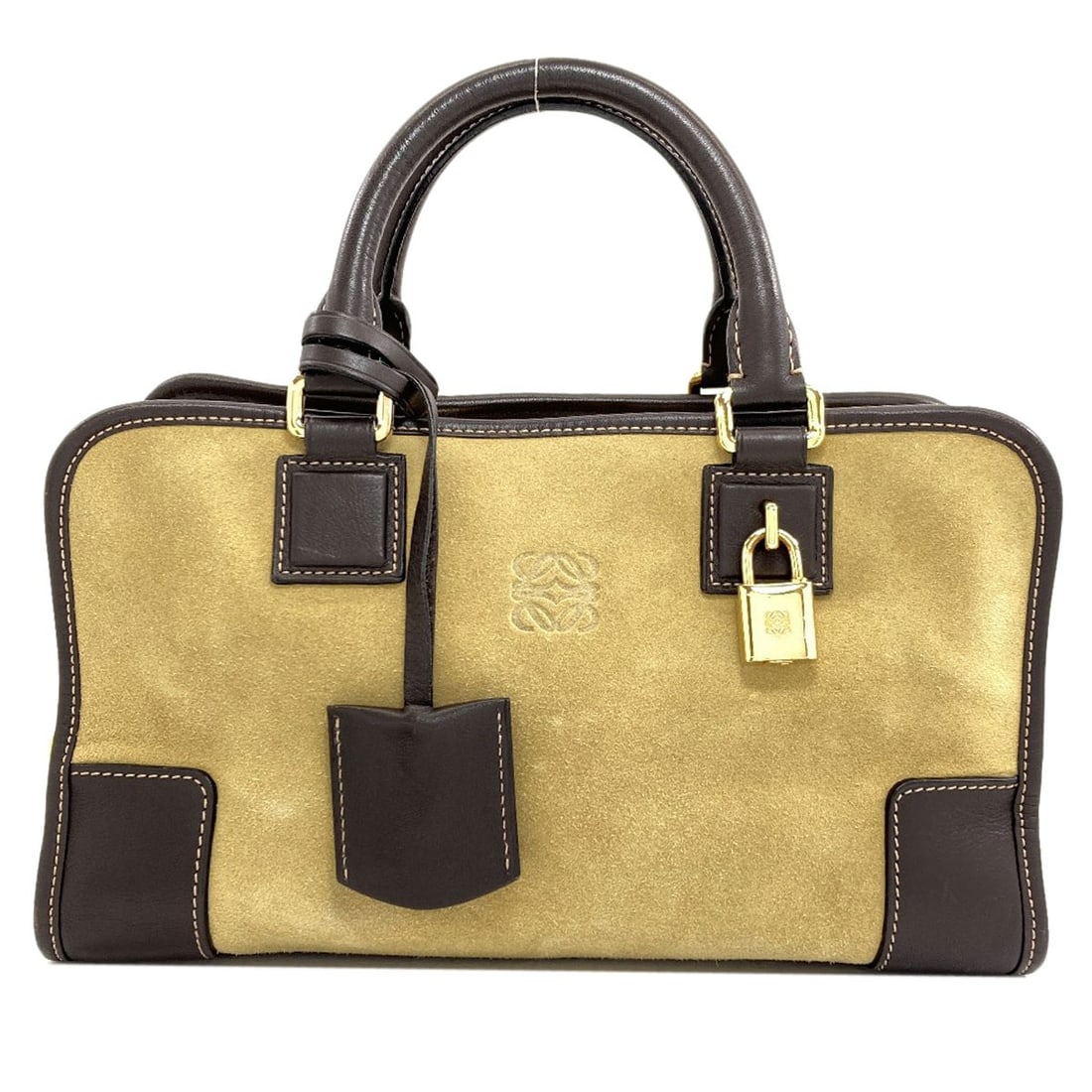 Handbag Loewe Suede Calf Amazona: Handbag Loewe Suede Calf Amazona Suede exterior in brown, classic handbag style from LOEWE. This Brown Loewe Suede Calf Amazona Handbag features a timeless design and premium suede material. Item Spec