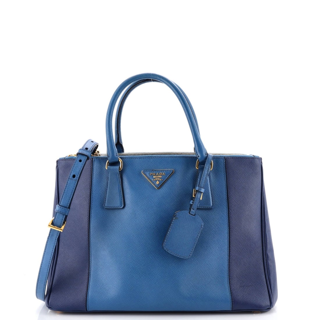 Saffiano Leather Lux Double Zip Tote Medium Prada Bicolor: Saffiano Leather Lux Double Zip Tote Medium Prada Bicolor Saffiano Leather Lux Double Zip Tote Medium Prada Bicolor features a sturdy blue exterior with gold hardware, measuring 10" high and 13.5"