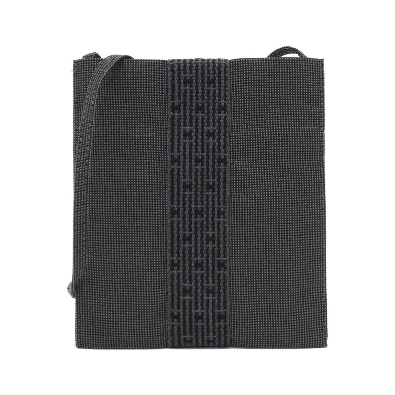 Shoulder Bag Pochette Hermes: Shoulder Bag Pochette Hermes Black canvas pochette shoulder bag with a classic design, featuring a timeless black color and clean lines. The bag has some minor scratches and dirt, but remains in very