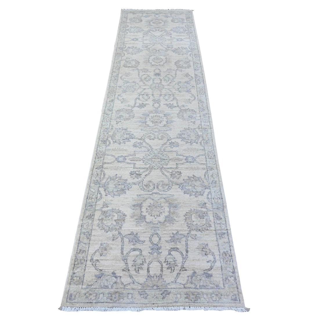 2'6"x9'10" White Hand Knotted Organic Wool White Wash Peshawar Runner Rug: 2'6"x9'10" White Hand Knotted Organic Wool White Wash Peshawar Runner Rug Hand-knotted in the traditional Peshawar style, this stunning ivory wool runner rug boasts an elegant white wash finish and
