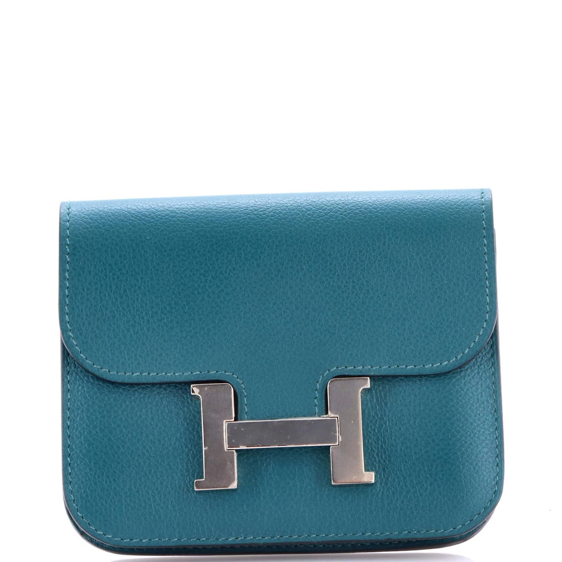 Slim Wallet Evercolor by Hermes: Slim Wallet Evercolor by Hermes Slim Wallet Evercolor by Hermes in blue, made from high-quality leather with palladium hardware and a signature. The wallet measures 4" x 5" x 1" and features minor