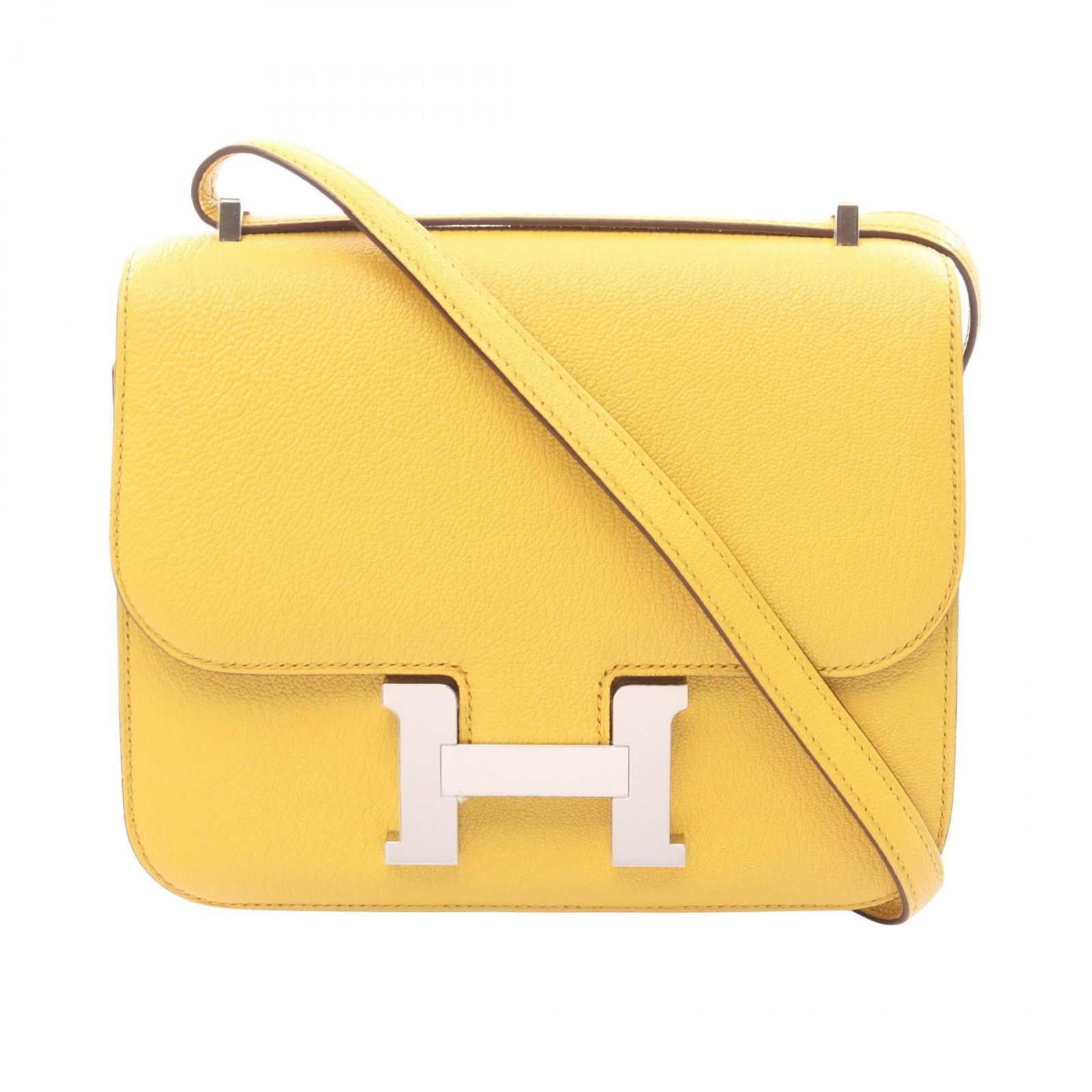 Chevre leather shoulder bag by Hermes: Chevre leather shoulder bag by Hermes Chevre leather shoulder bag by Hermes features a unique yellow color and silver hardware, adding a touch of elegance to any outfit. Made from high-quality chevre 