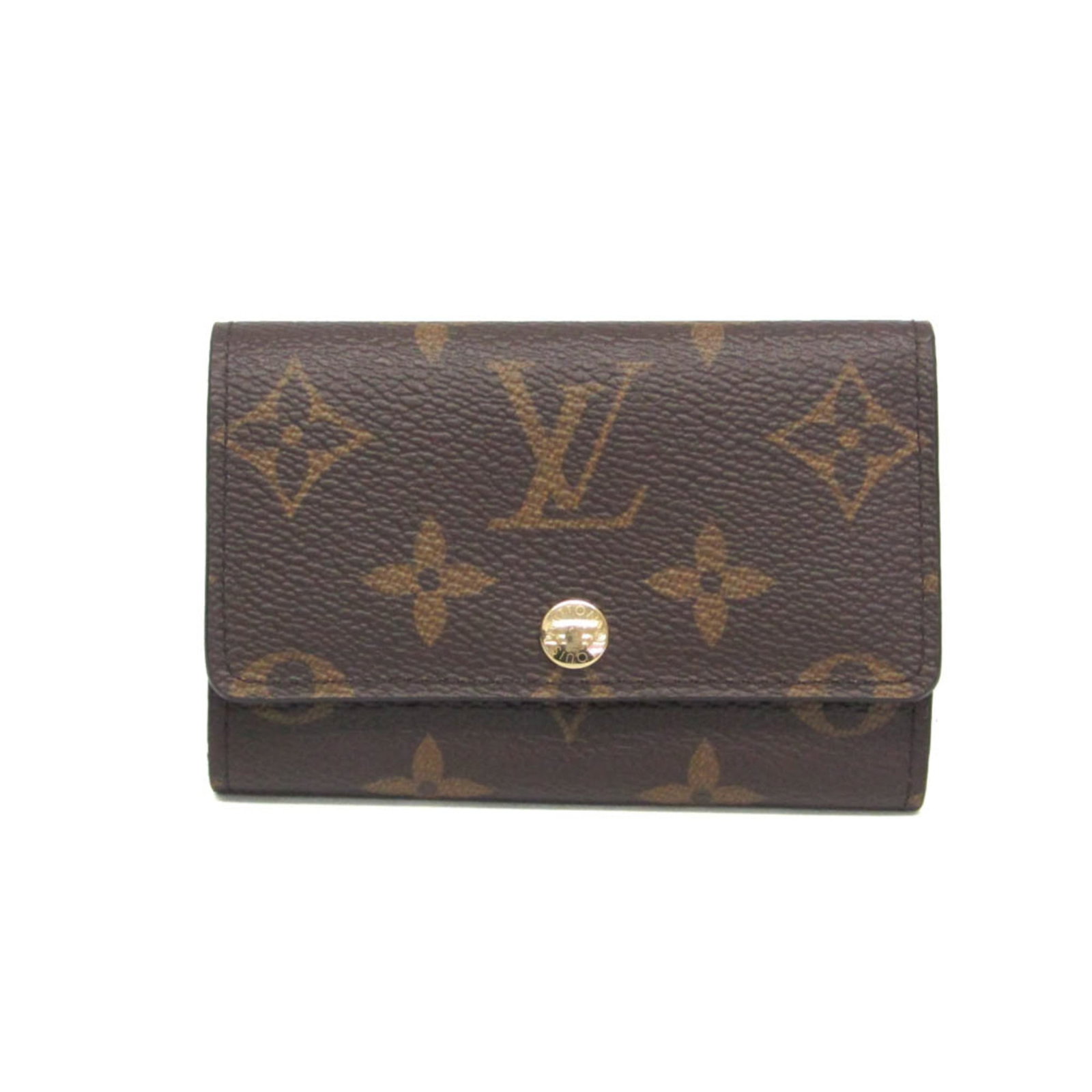 Keycase of Monogram Louis Vuitton: Keycase of Monogram Louis Vuitton Monogram Louis Vuitton Keycase - A timeless accessory with a classic design, featuring the iconic monogram pattern and a snap closure. This keycase has six hooks for