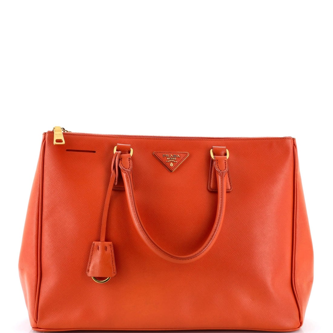 Prada Double Zip Lux Tote Saffiano Leather Large: Prada Double Zip Lux Tote Saffiano Leather Large Orange Saffiano Leather Double Zip Lux Tote in Large Size, featuring a spacious interior and gold hardware. The exterior showcases subtle wear from
