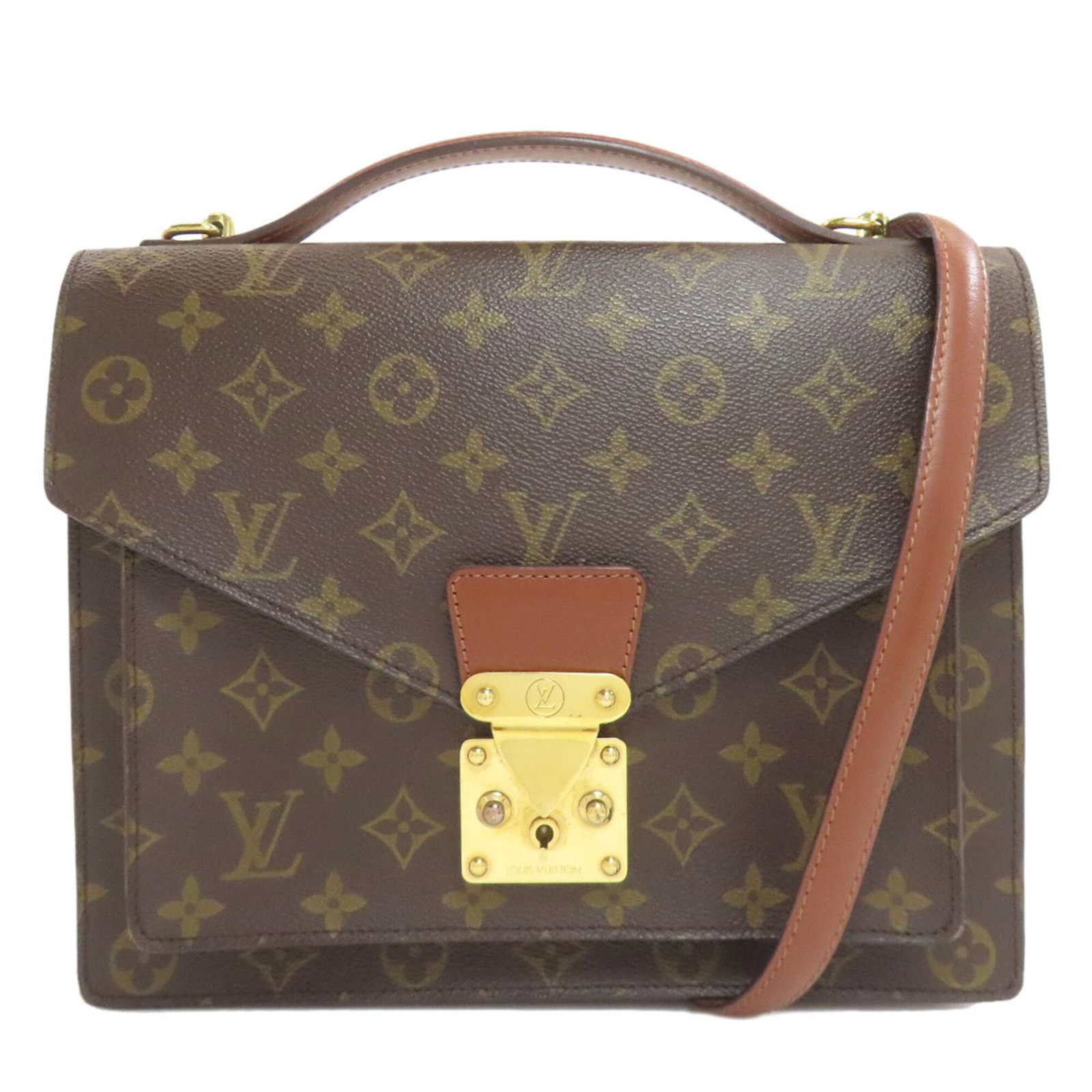Canvas monogram handbag Vuitton Louis: Canvas monogram handbag Vuitton Louis Canvas monogram handbag in brown with visible scratches and dirt, measuring 21cm x 28cm x 4cm. This Louis Vuitton item features the iconic monogram pattern on