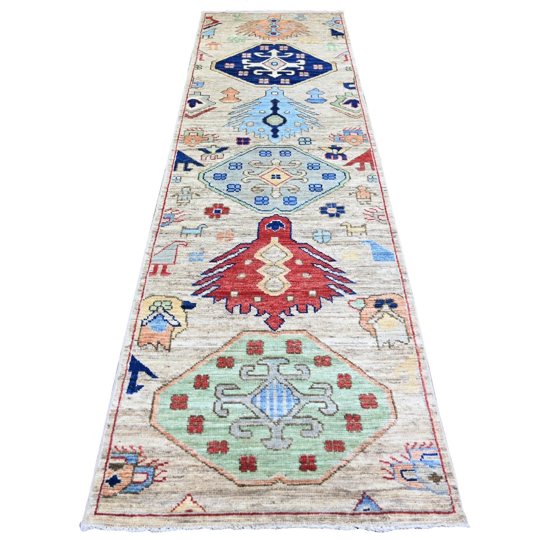 3'x10' Tan Color Anatolian Village Inspired Wool Hand Knotted Runner Rug: 3'x10' Tan Color Anatolian Village Inspired Wool Hand Knotted Runner Rug Tan Anatolian Village Inspired Wool Hand Knotted Runner Rug measures 3'0" x 10'0" / 91 CM X 305 CM, featuring a brown field col