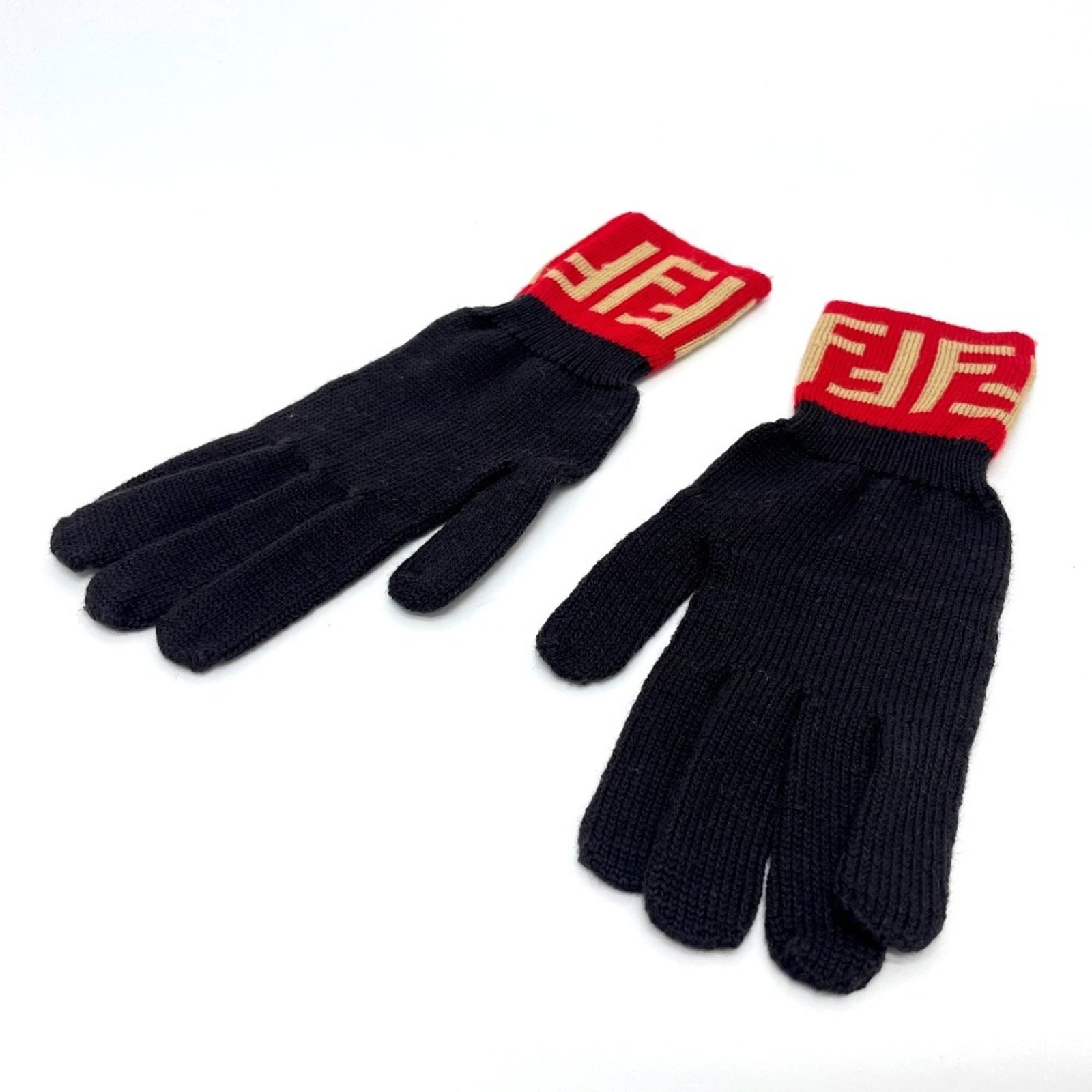 Warm Wool Gloves By Fendi: Warm Wool Gloves By Fendi Warm and cozy, these brown wool gloves by Fendi feature a rich color palette with a striking red accent. Made from high-quality wool, they offer excellent warmth and comfort