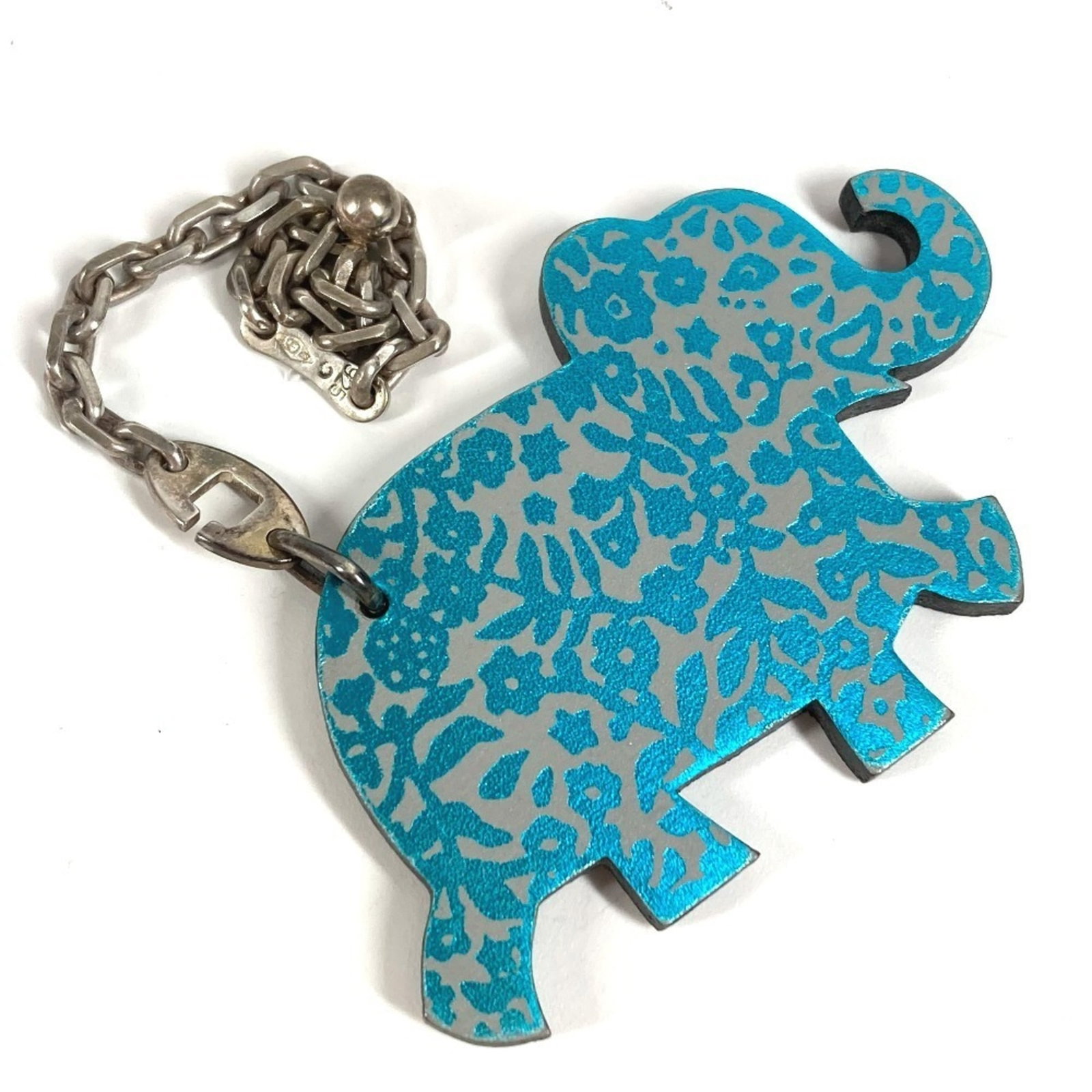 Keyring Leather by Hermes: Keyring Leather by Hermes Keyring Leather by Hermes - A stylish accessory for everyday use, featuring a high-quality leather construction and subtle blue or gray tone. The item shows signs of gentle