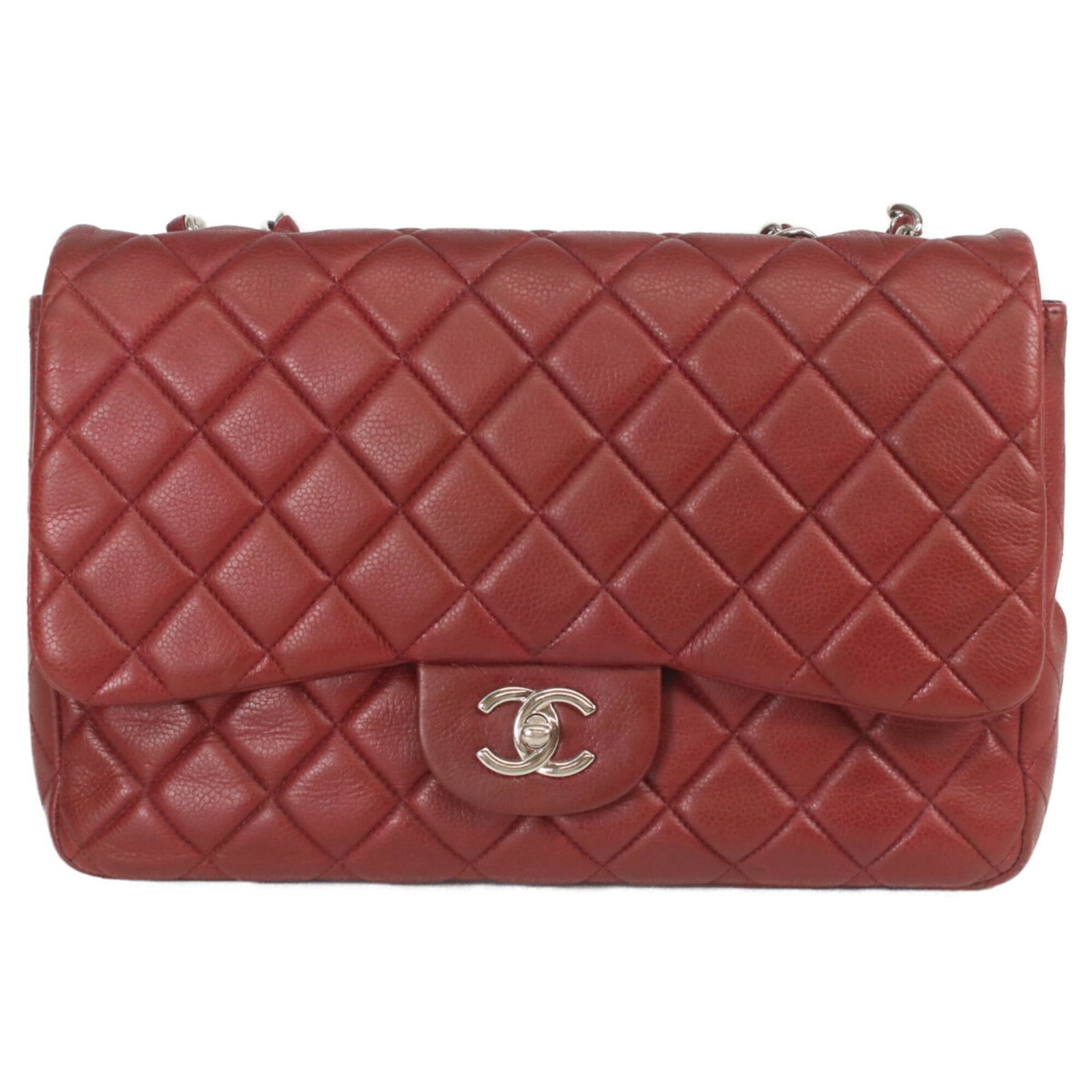 Calfskin Grained Tote Bag By Chanel: Calfskin Grained Tote Bag By Chanel Chanel's iconic calfskin grain tote bag in bold red, featuring silver hardware and a timeless design. This pre-owned tote boasts the signature Chanel style with its
