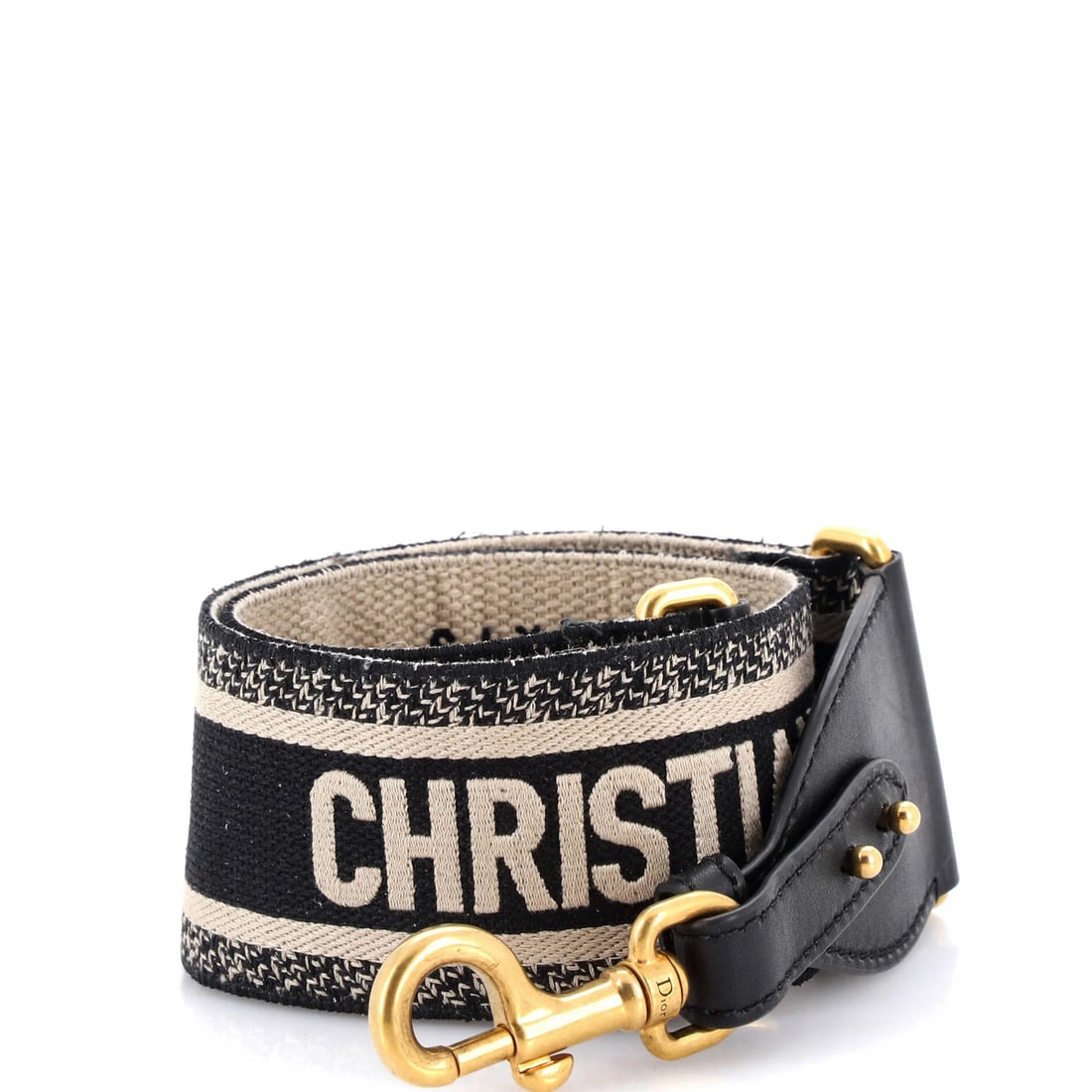 Christian Dior logo canvas shoulder strap embroidered: Christian Dior logo canvas shoulder strap embroidered Black canvas shoulder strap with embroidered Christian Dior logo, measuring 37" in length and 3" in width. The exterior features a plain canvas