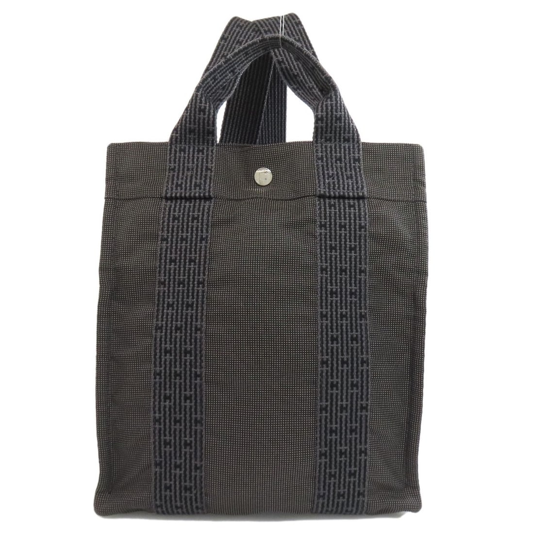 Her Line Hermes Backpack Canvas Daypack: Her Line Hermes Backpack Canvas Daypack Gray canvas backpack with A* style design, featuring a classic daypack silhouette. This versatile bag boasts a timeless gray exterior color and canvas