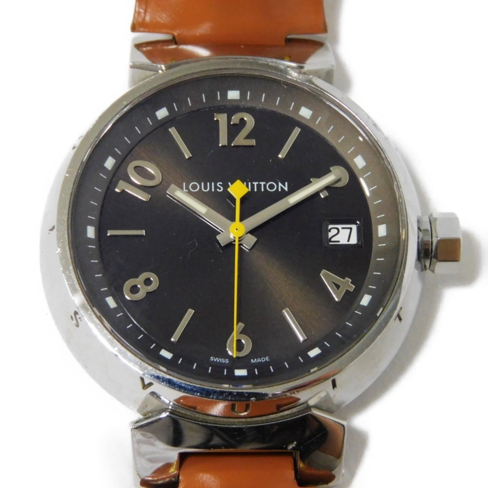 Louis Vuitton Wristwatch: Louis Vuitton Wristwatch Stainless steel case and leather band make for a stylish combination in this Louis Vuitton wristwatch. The brown dial adds a touch of sophistication, while the 34mm diameter