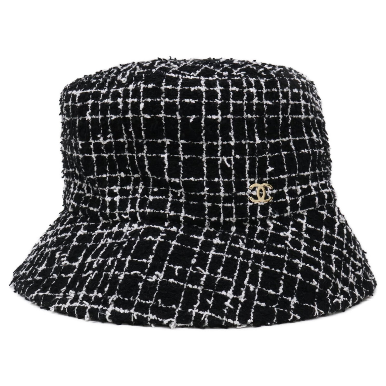 Tweed Chanel Bucket Hat: Tweed Chanel Bucket Hat Tweed Chanel Bucket Hat in black, made from high-quality tweed material with a few traces of usage visible. The hat bears some scratches and dirt but remains in very good condi