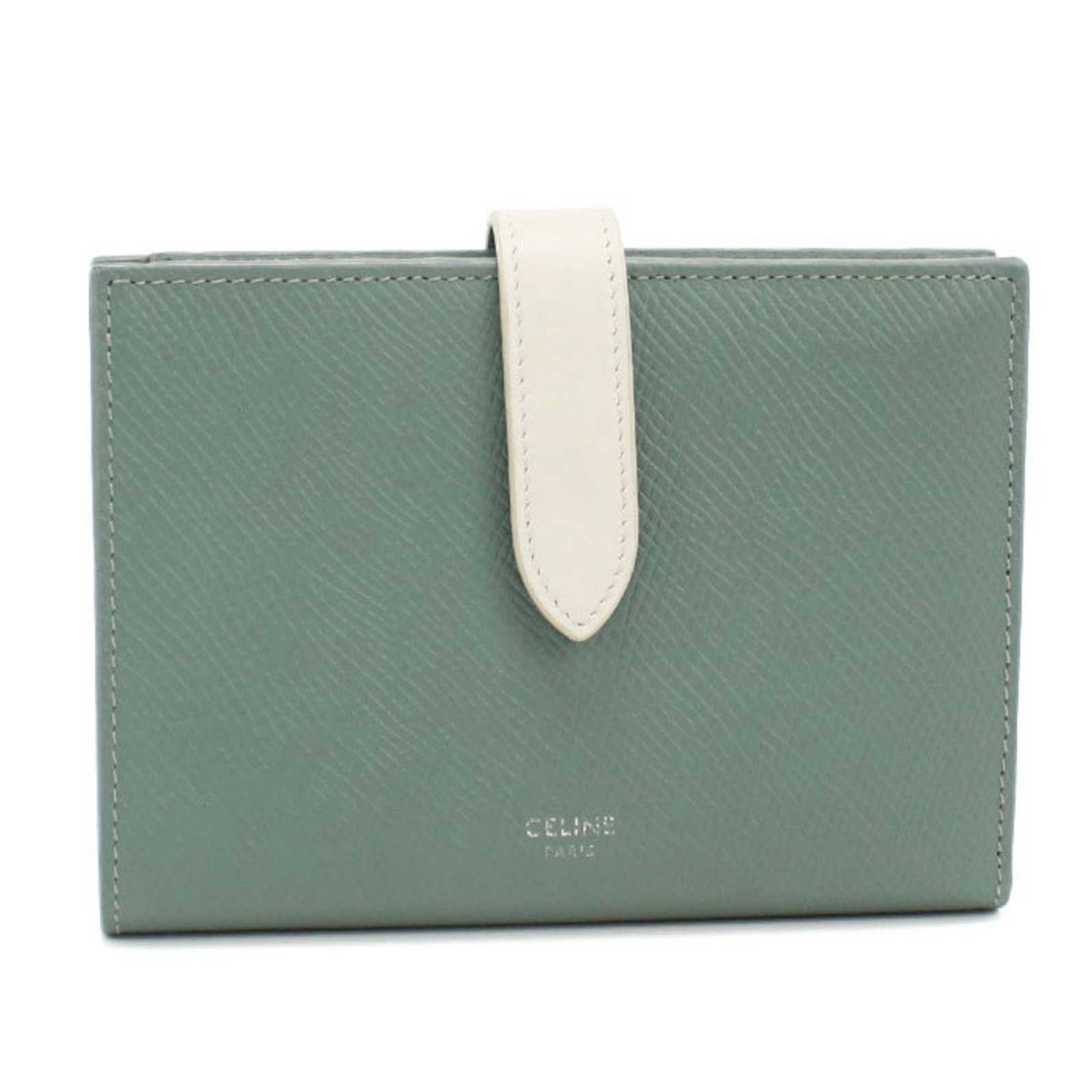 Celine Middle Wallet (Bi-Fold) Leather: Celine Middle Wallet (Bi-Fold) Leather Calfskin leather construction provides durability and style, while the bi-fold design offers versatility. This green Celine middle wallet features a subtle,