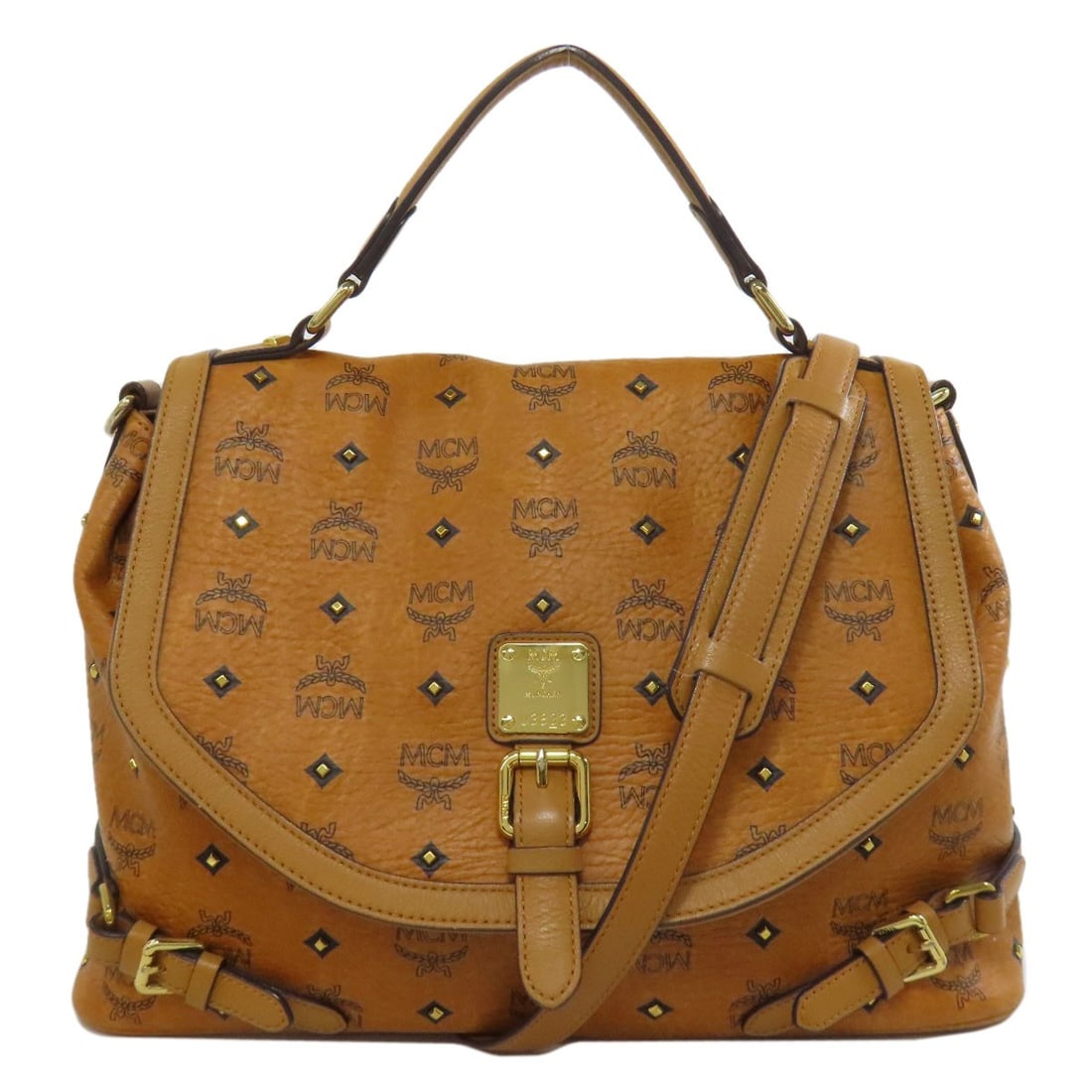Handbag Mcm 2way Pvc: Handbag Mcm 2way Pvc Brown MCM handbag with PVC exterior. This two-way bag features a unique design and construction, showcasing the brand's signature style. Made from high-quality PVC material, it