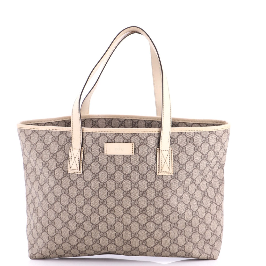 Gucci plus tote medium canvas coated leather gg: Gucci plus tote medium canvas coated leather gg Brown Gucci Plus Tote Medium Canvas Coated Leather GG - Very Good Condition. This medium-sized tote features a classic design with canvas coated leather
