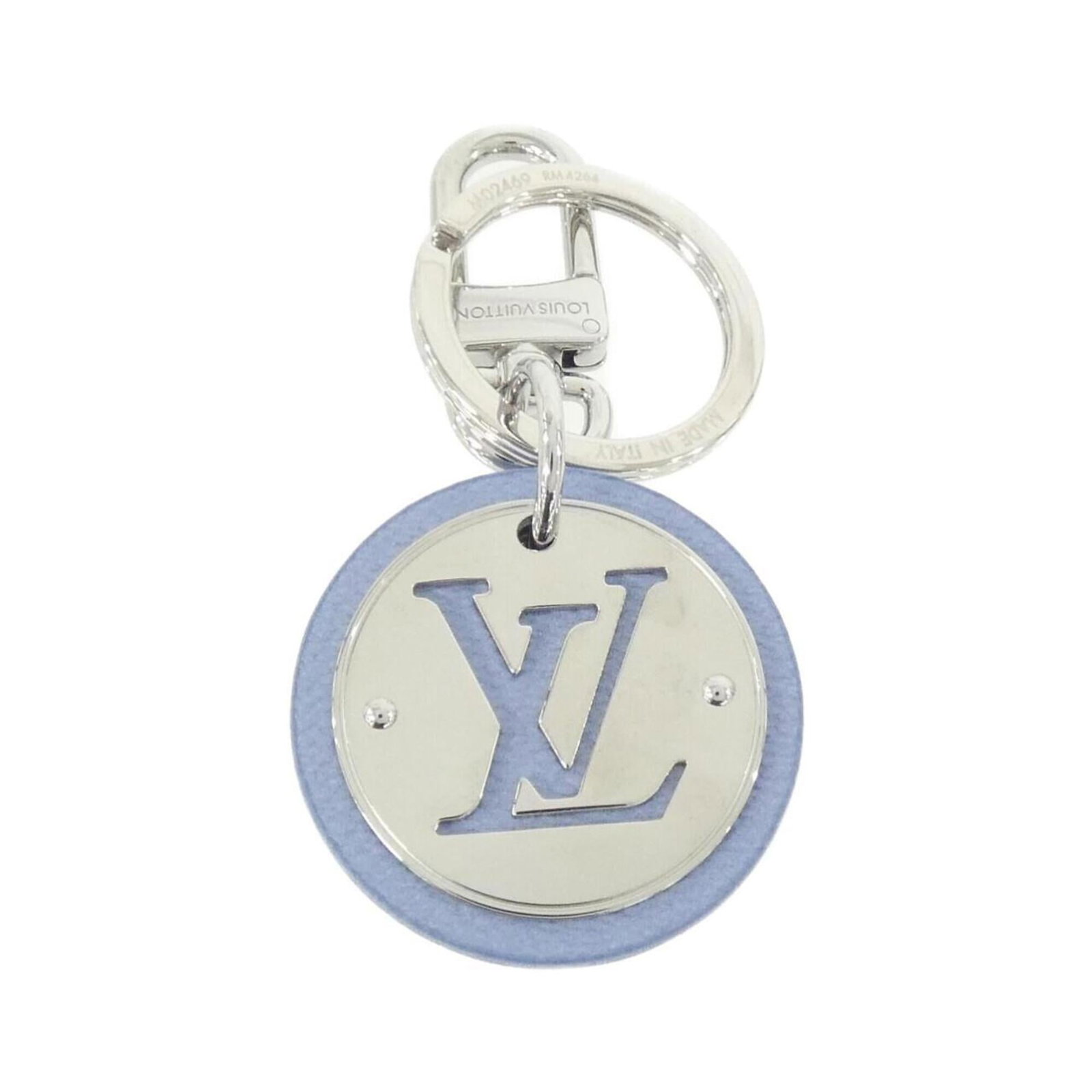 Louis Vuitton Keyring: Louis Vuitton Keyring The Louis Vuitton keyring boasts a sleek, silver finish and a vibrant blue hue. With a few subtle scratches and signs of wear, it still exudes the timeless elegance of the