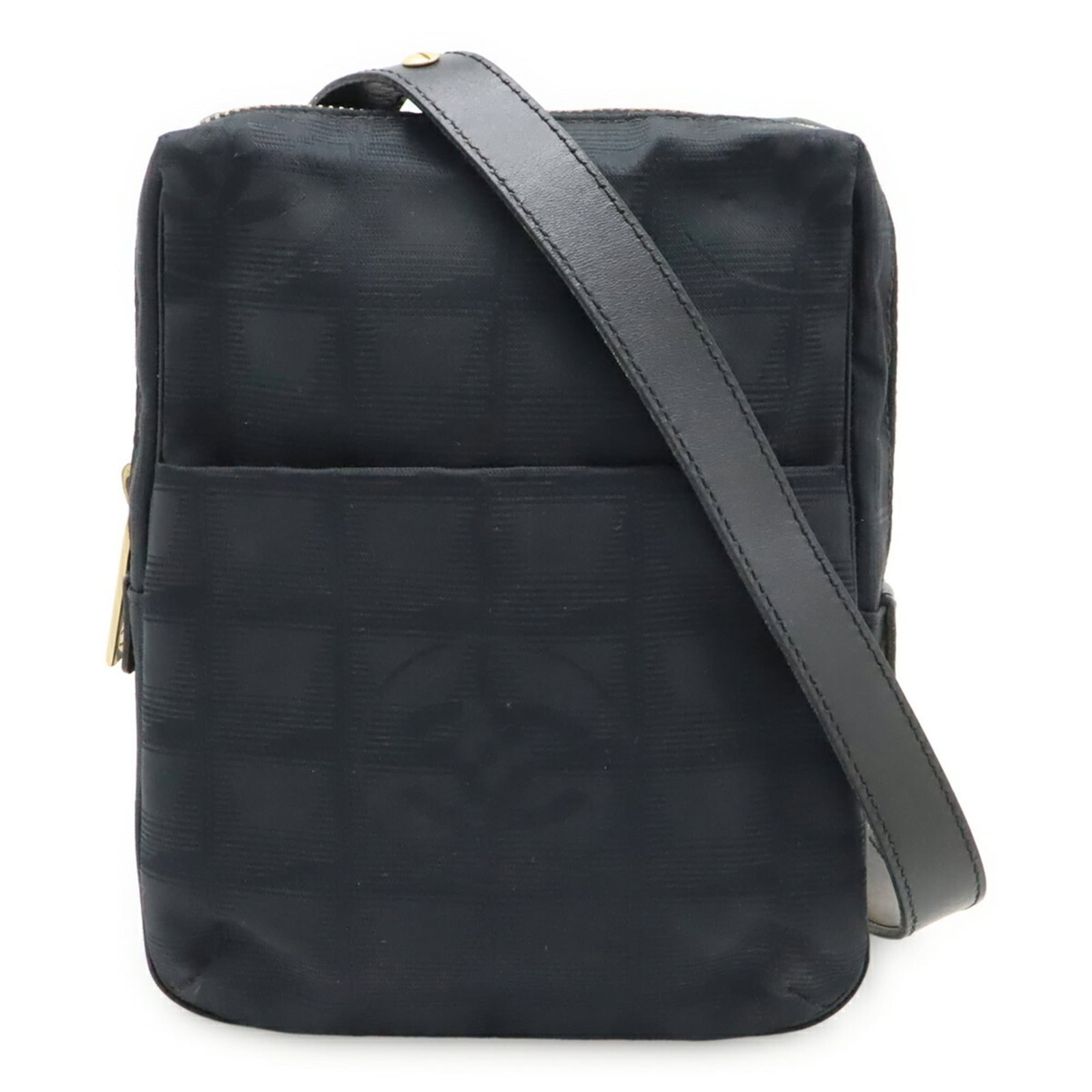 Nylon leather shoulder bag by Chanel: Nylon leather shoulder bag by Chanel Nylon leather shoulder bag by Chanel, featuring a sleek black design with subtle scratches and dirt from previous use. The bag measures 19cm x 15.5cm x 4.5cm and