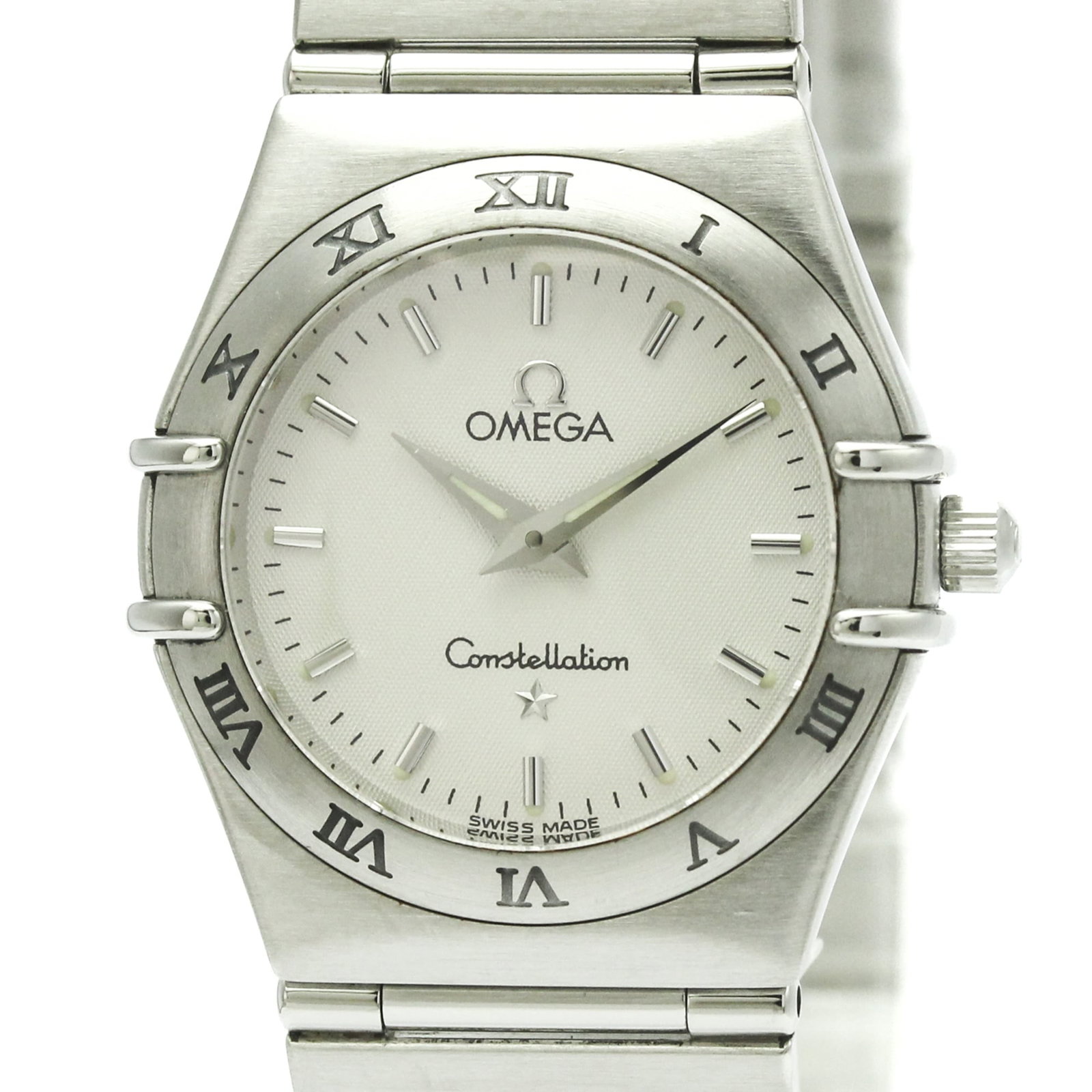 Omega Wristwatch: Omega Wristwatch Stainless steel case and band add a sleek touch to this silver Omega wristwatch, featuring a classic dress/formal style. The watch boasts a 25mm diameter case with some minor scratche