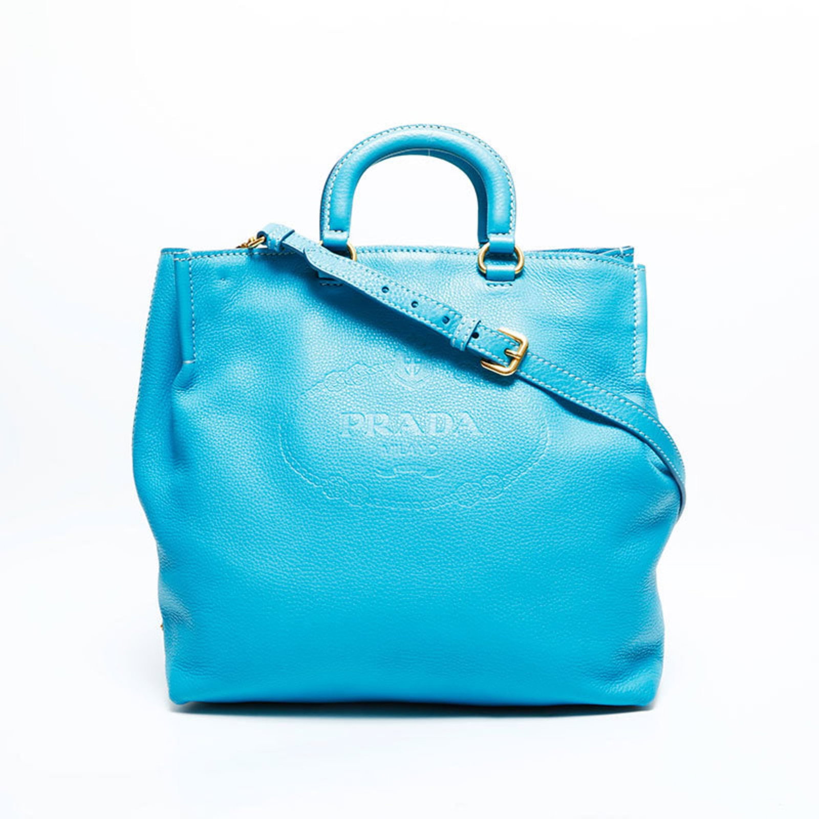 Prada Handbag Leather: Prada Handbag Leather Blue Prada Handbag Leather. Made from high-quality leather, this women's handbag features a classic design with a signature blue hue. With its sturdy strap and comfortable handle