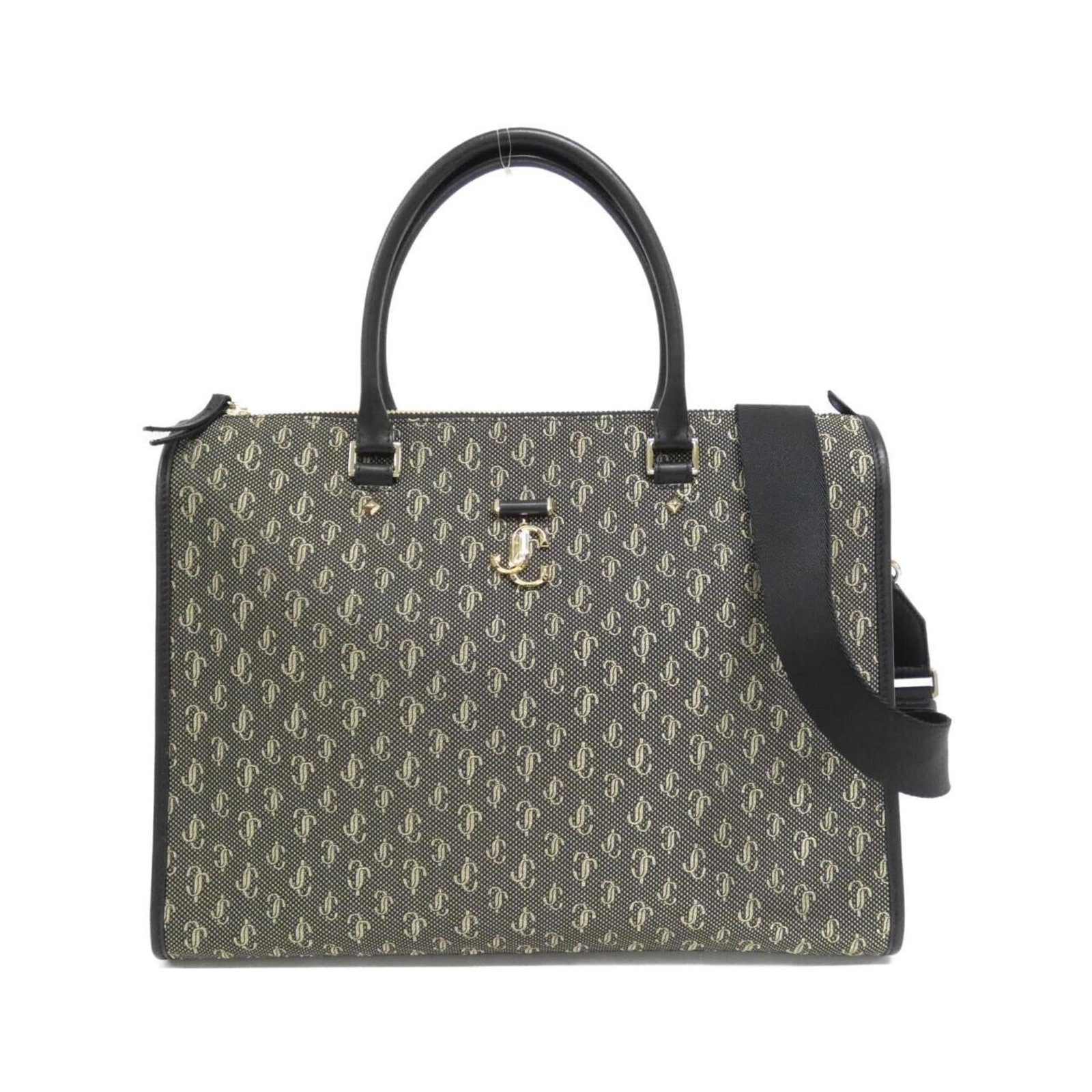Jacquard Leather Jimmy Choo Handbag: Jacquard Leather Jimmy Choo Handbag Jacquard leather and gold hardware come together in this sleek Jimmy Choo handbag, featuring a classic black color with subtle touches of gold. The bag's durable