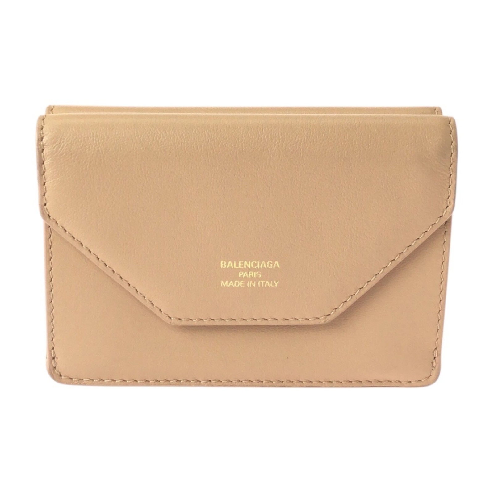 Balenciaga Wallet (Tri-Fold) Leather: Balenciaga Wallet (Tri-Fold) Leather This Balenciaga tri-fold leather wallet features a classic design with clean lines and a timeless aesthetic. Made from high-quality beige leather, it boasts a